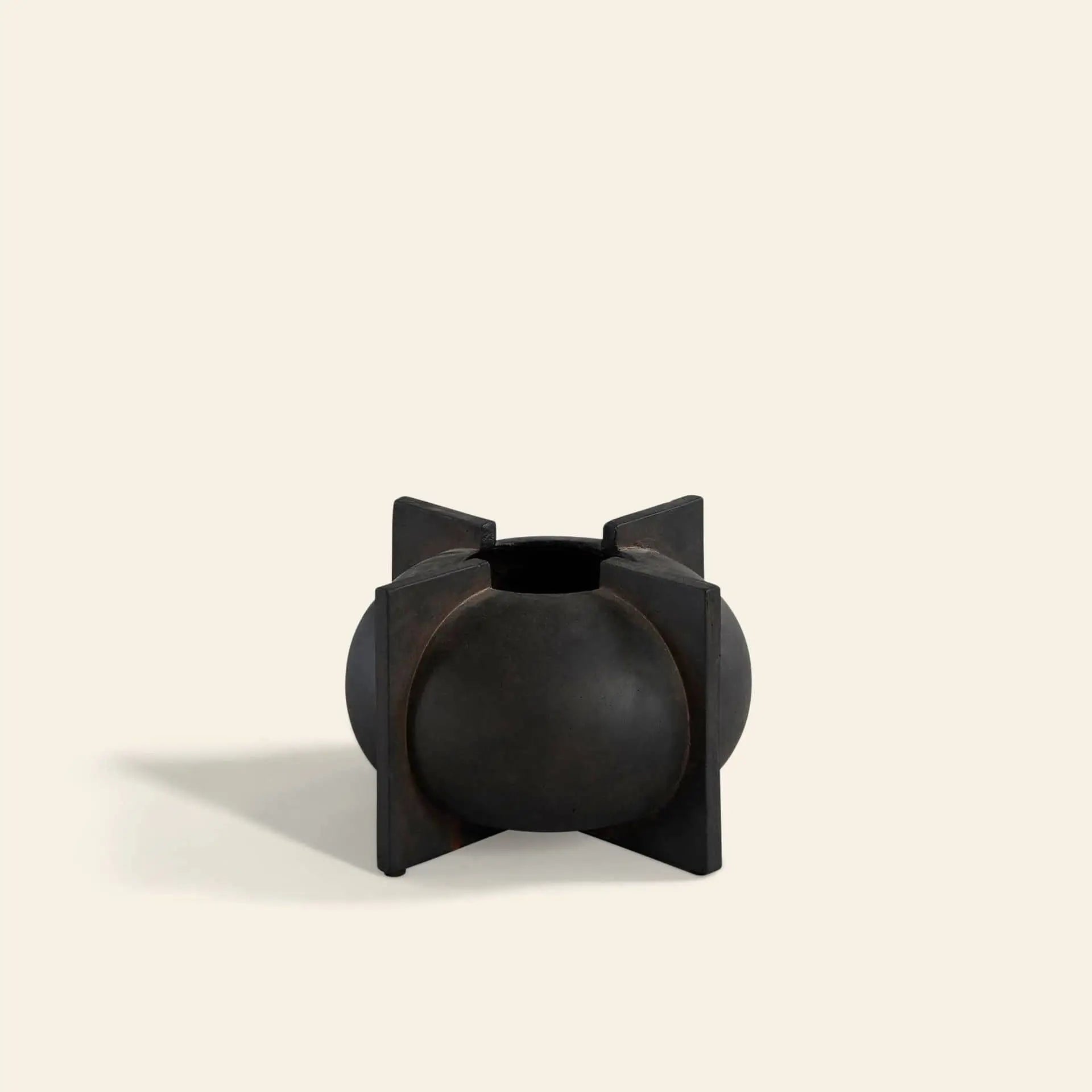 The 101 Copenhagen Kyoto Vase, Mini by 101 Copenhagen is a small, round, dark-toned ceramic vase with four flat rectangular panels, hand-glazed and displayed on a plain light beige background.