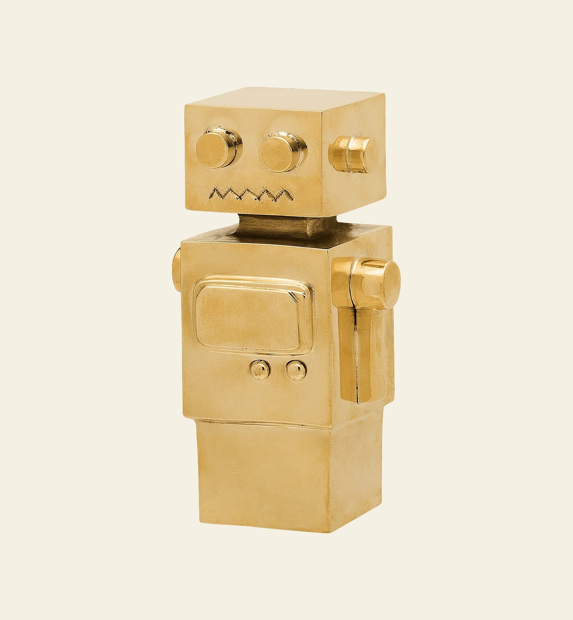 The Anna + Nina Back to the Future Figure features a gold finish, robot-inspired design with geometric details—ideal for fans and collectors of Anna + Nina figures.