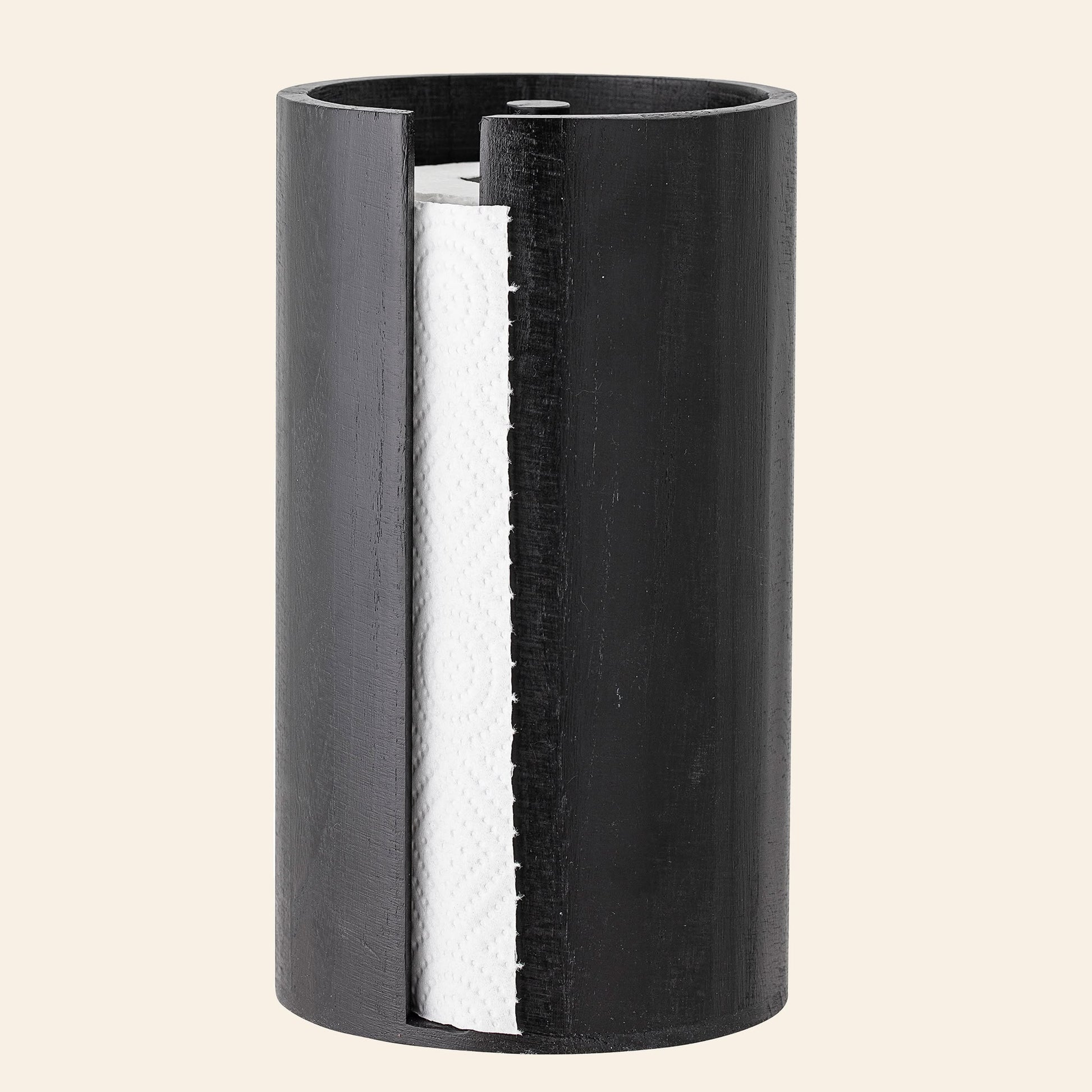 The Bloomingville Celian Kitchen Paper Stand features a sleek black cylindrical design with a vertical cutout, revealing the roll inside—a minimalist accessory from Bloomingville that brings Scandinavian elegance to any space.