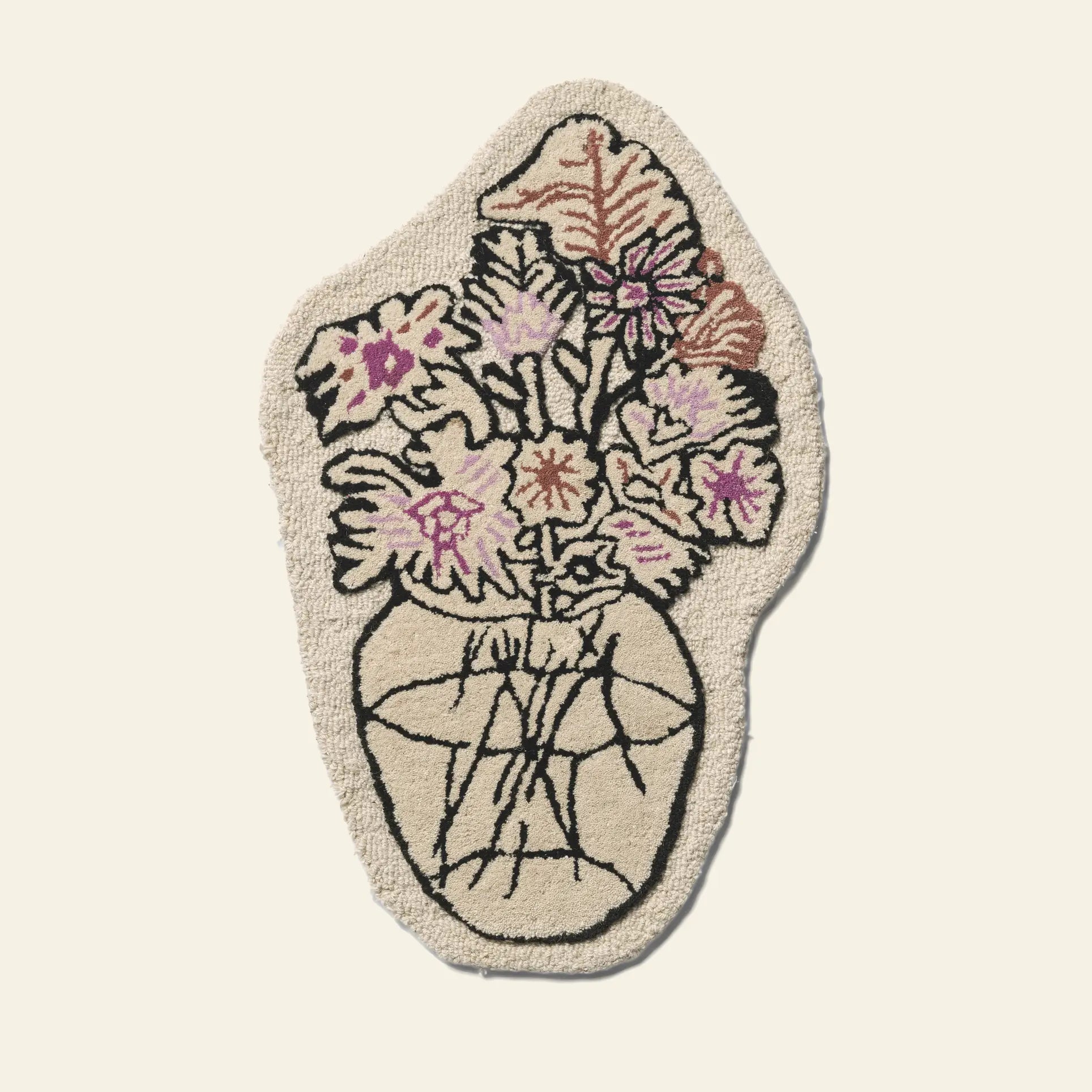 The Bongusta Autumn Flowers Rug by Bongusta is handcrafted from 100% wool, featuring an irregular shape and a black line vase with abstract pink and purple flowers on a cream background.
