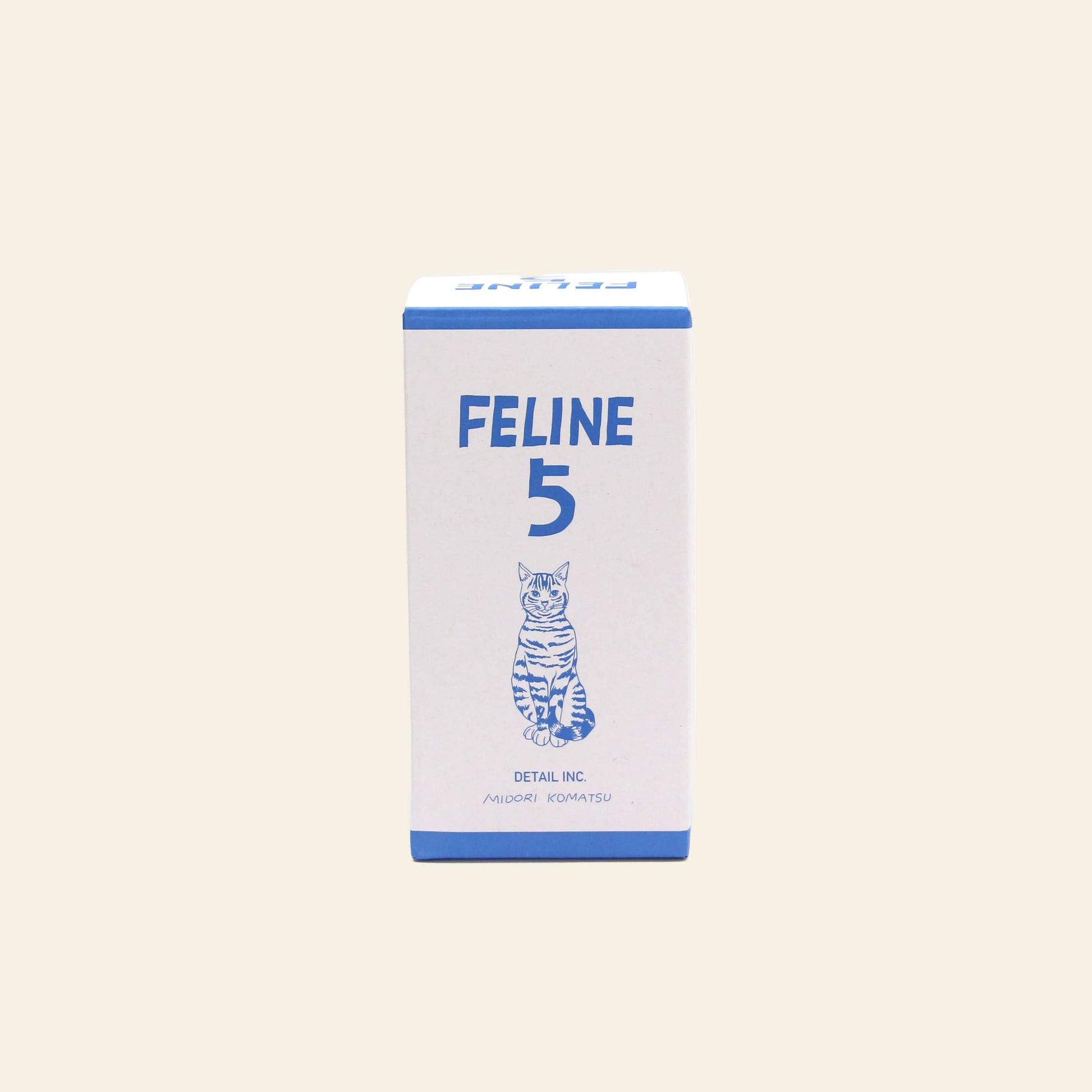 A beige rectangular box labeled DETAIL Feline 5 Nesting Dolls in blue, with a cat illustration below the text—ideal for fans of nesting dolls and cat lovers.
