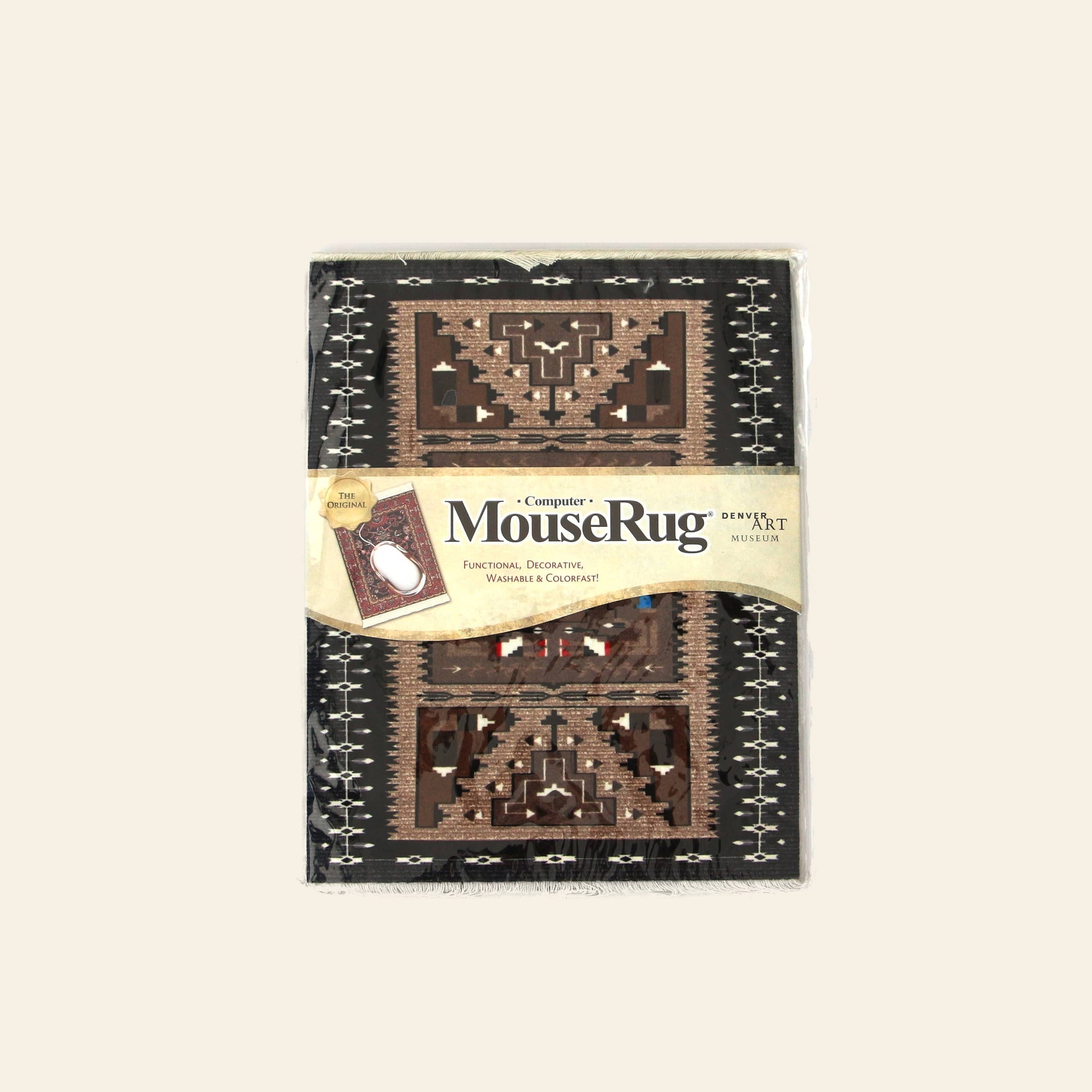 The DETAIL Mouse Rug Bessie Barber by DETAIL is a mouse pad with a decorative, rug-inspired pattern based on Navajo weaving in brown, black, and tan geometric designs, shown against a light background.