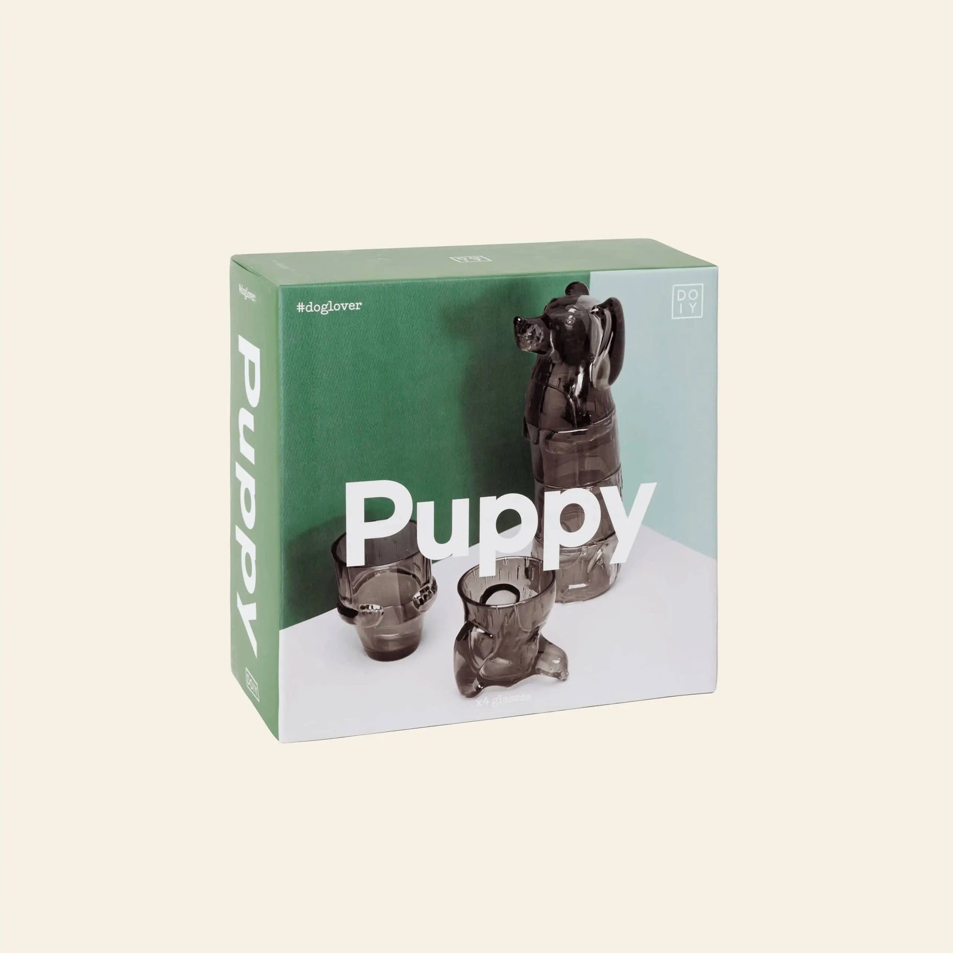 A box labeled DOIY Puppy Glasses, Set of 4, displays stackable brown dog-shaped glasses by DOIY in various sizes on a green and white background. The #doglover hashtag appears in the top left corner.