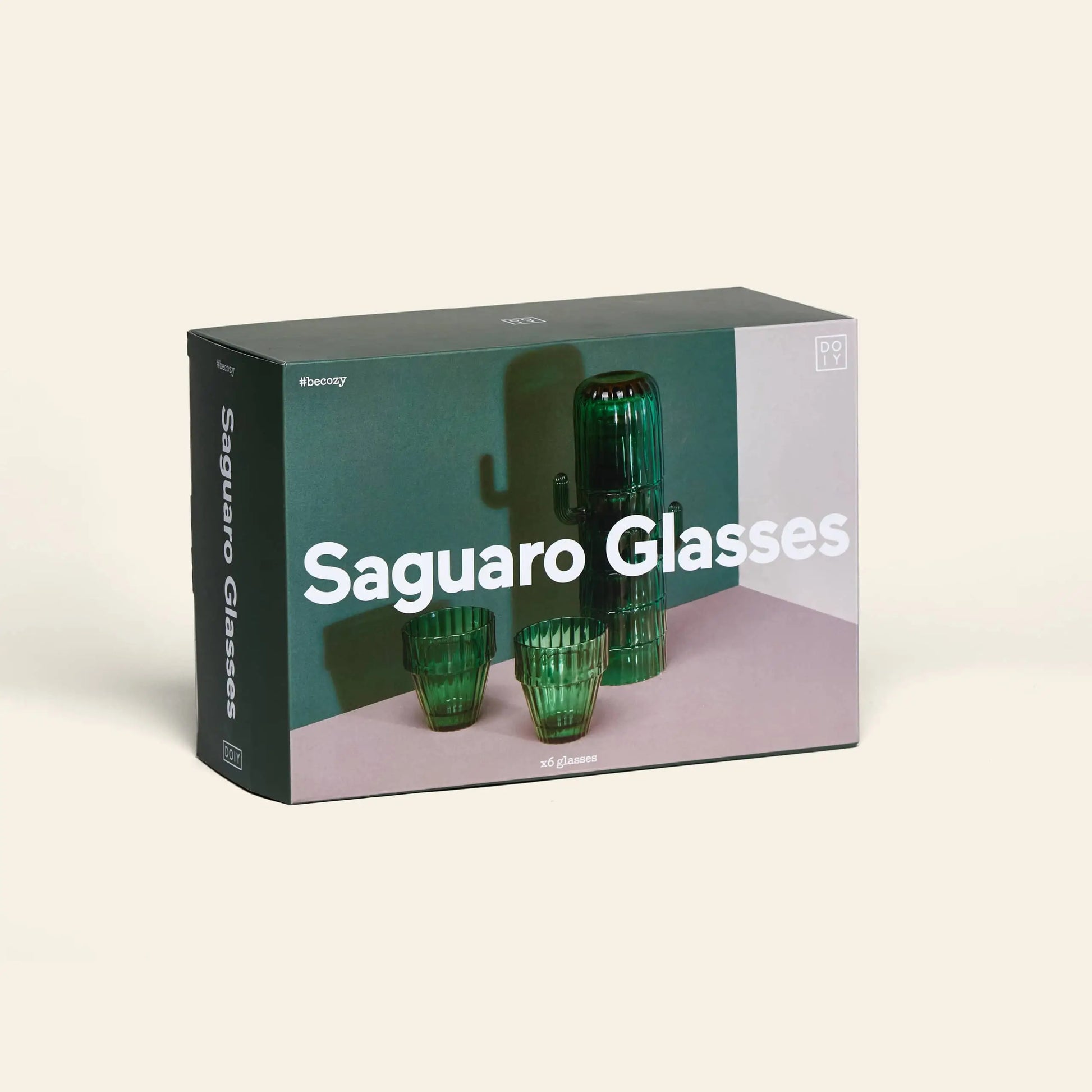 A set of 6 DOIY Saguaro Glasses by DOIY, shown on the box with two green ribbed, stackable glasses and a matching tall pitcher, plus the product name in large white text—a stylish home decor upgrade.