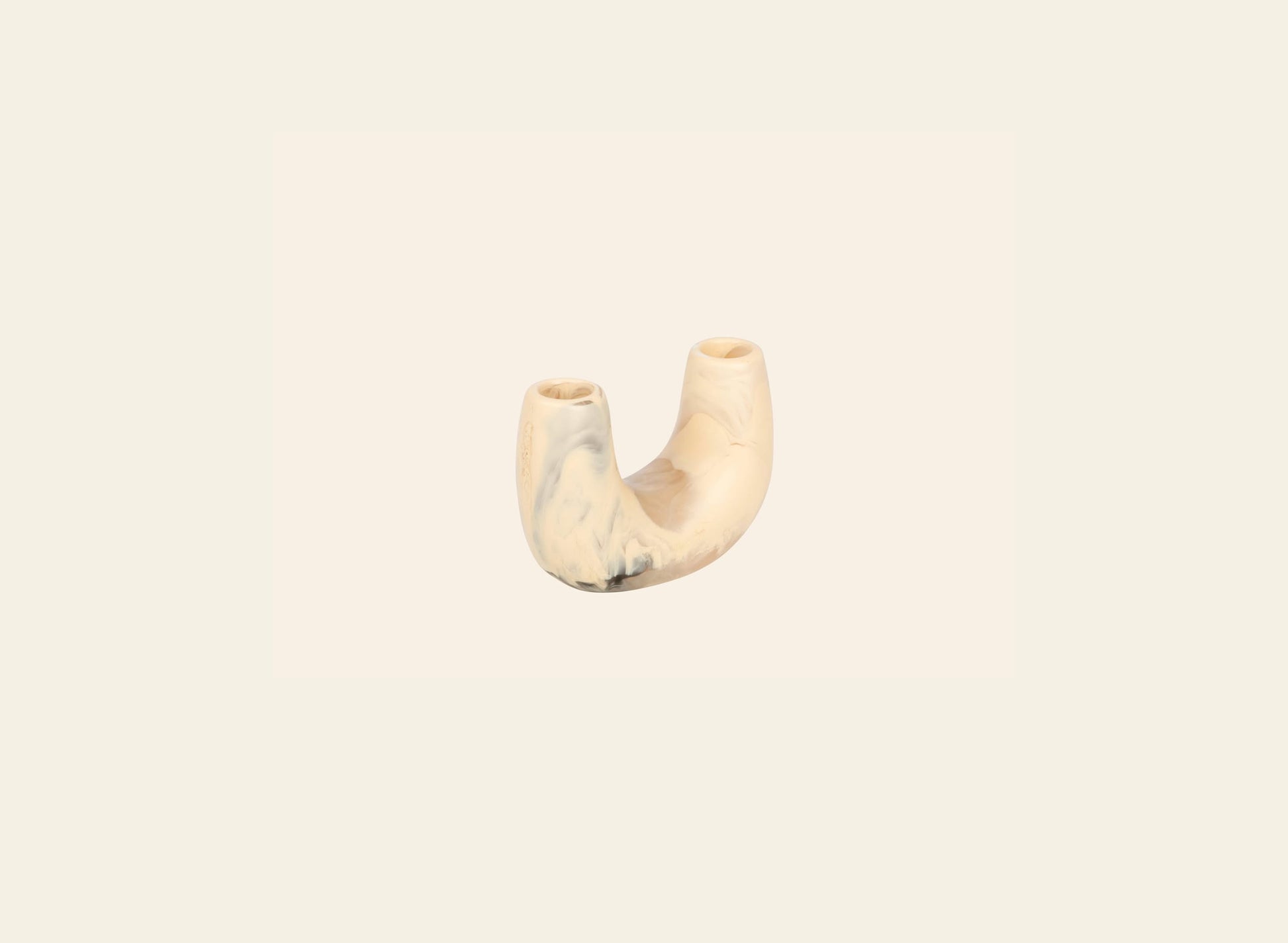The Dinosaur Designs Mini Branch Vase is a small, U-shaped marbled beige and cream ceramic piece with two openings, shown against a plain off-white background.