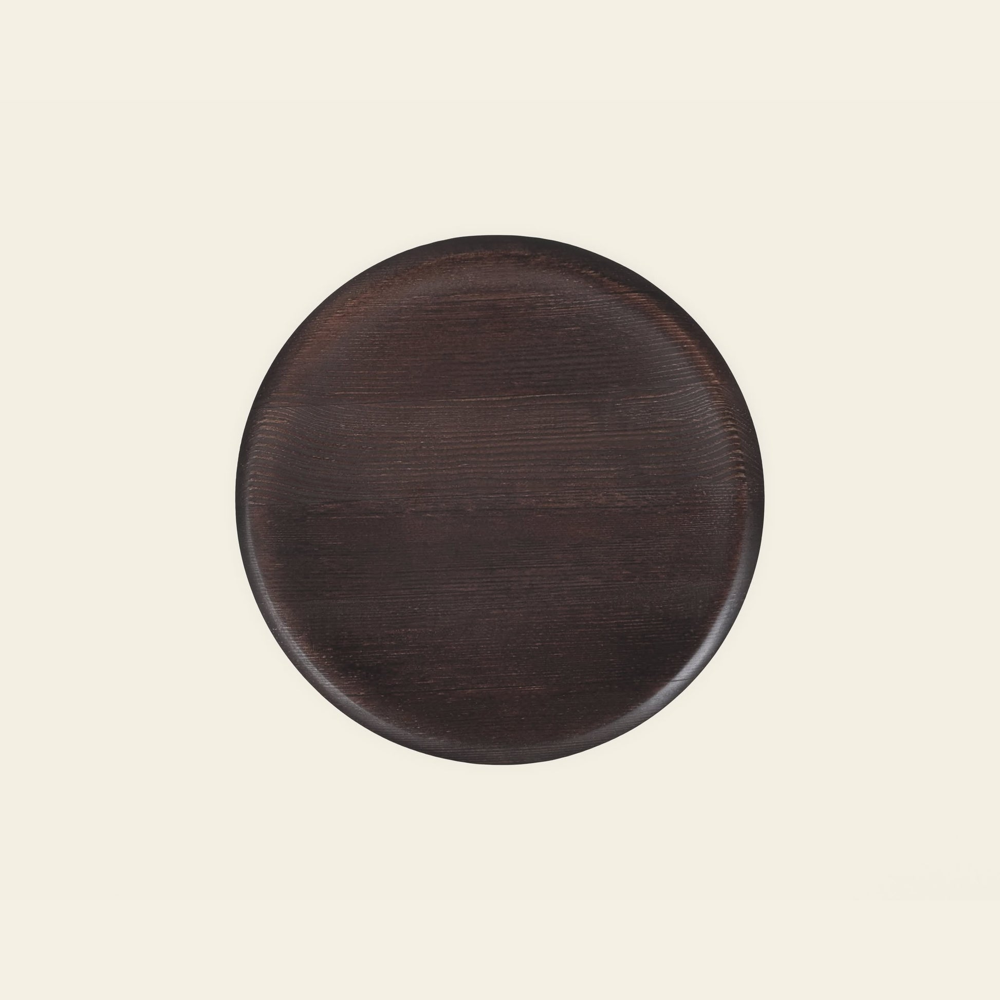 The FRAMA AML Stool by FRAMA, crafted from solid oiled pine with a smooth finish, is shown from above on a plain light background.