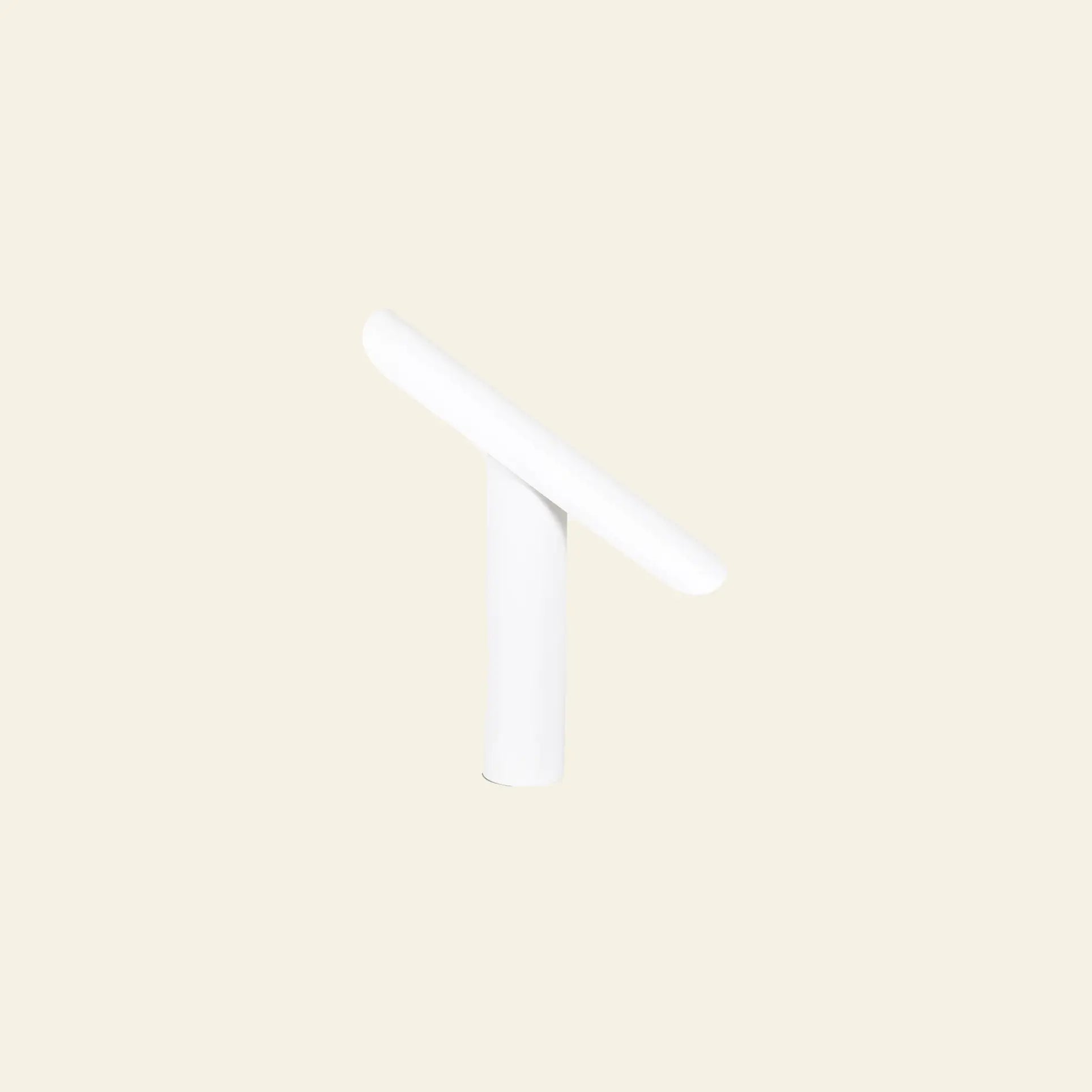 The FRAMA T-Lamp Table Lamp by FRAMA features a refined minimalist geometric design with a sleek, angular form, presented against a light beige background.