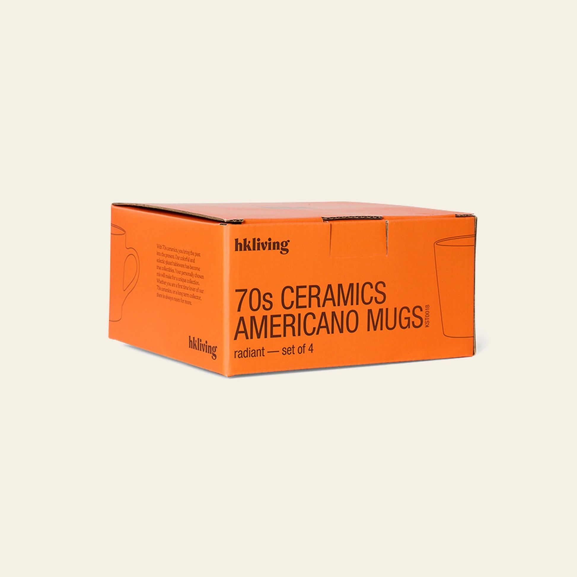 An orange box labeled HKliving 70s Ceramics: Americano Mugs, Set of 4 by HKliving contains four colorful mugs with outlined designs, displayed against a light beige background.