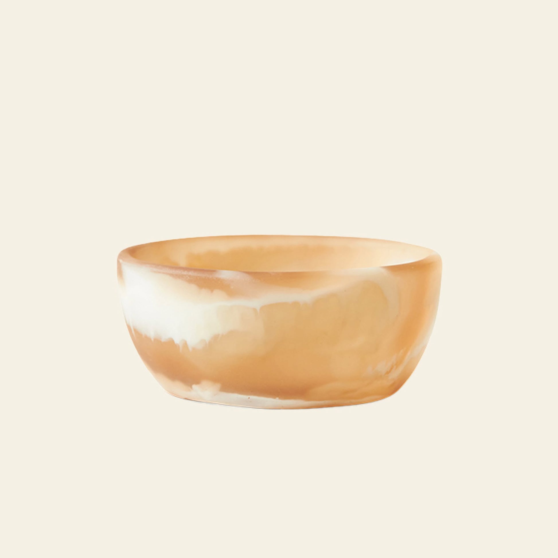 The HKLIVING Patio Bowl by HKLIVING is a small, round bowl crafted from marbled resin with a smooth, glossy finish in warm beige and light brown tones, featuring a subtle marbled pattern—ideal for outdoor entertaining.