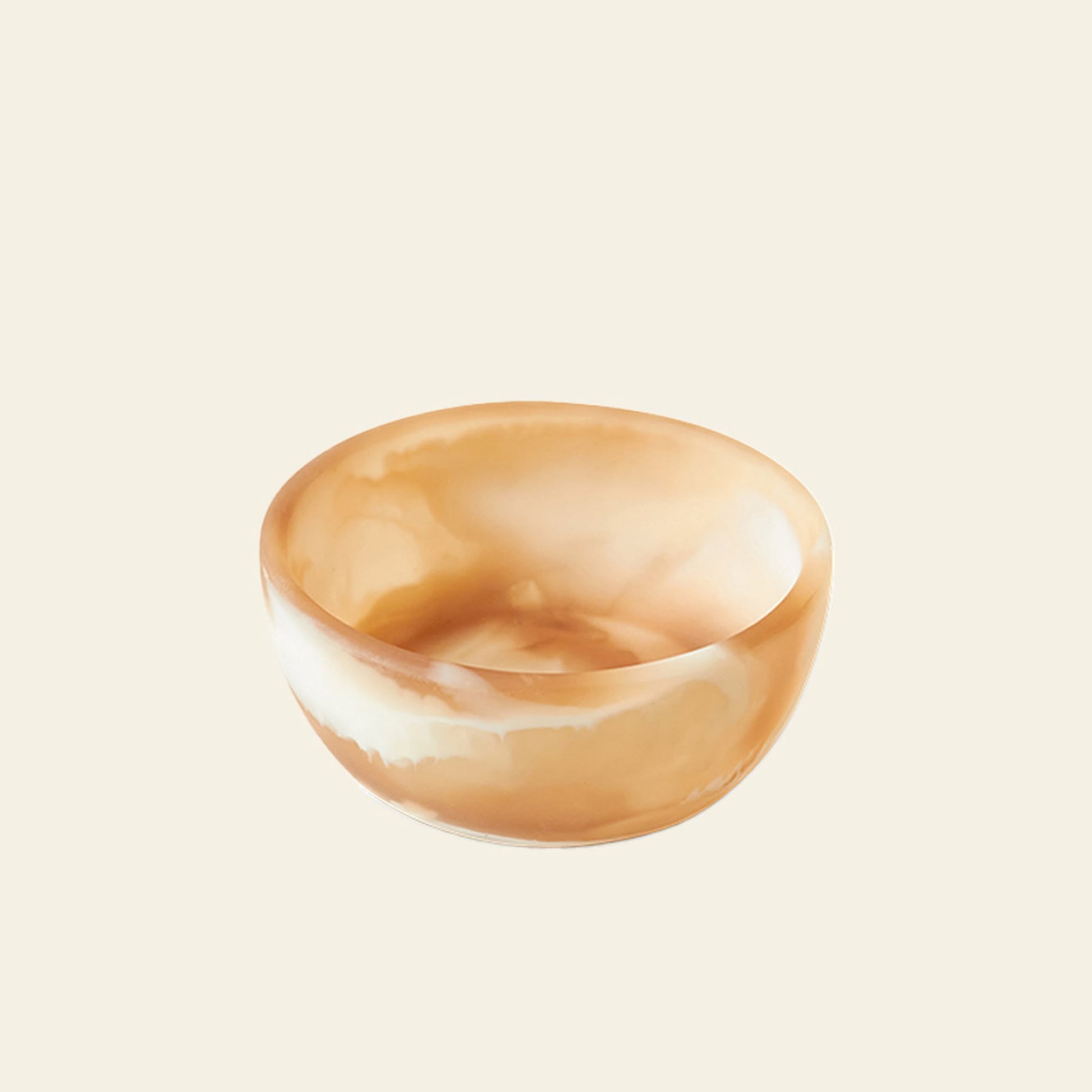 The HKLIVING Patio Bowl by HKLIVING features a smooth, round design in translucent onyx with beige and cream marbling—ideal for adding style to your outdoor entertaining.