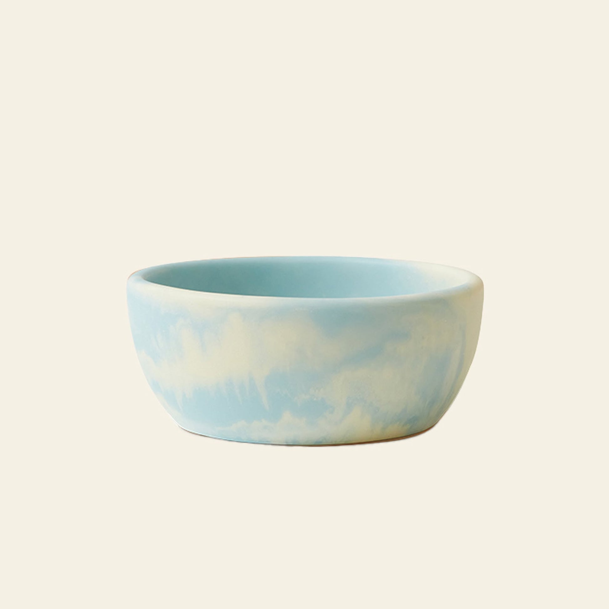 The HKLIVING Patio Bowl by HKLIVING features a round ceramic design with a soft blue and white cloud-like pattern, ideal for outdoor entertaining, displayed against a plain light beige background.
