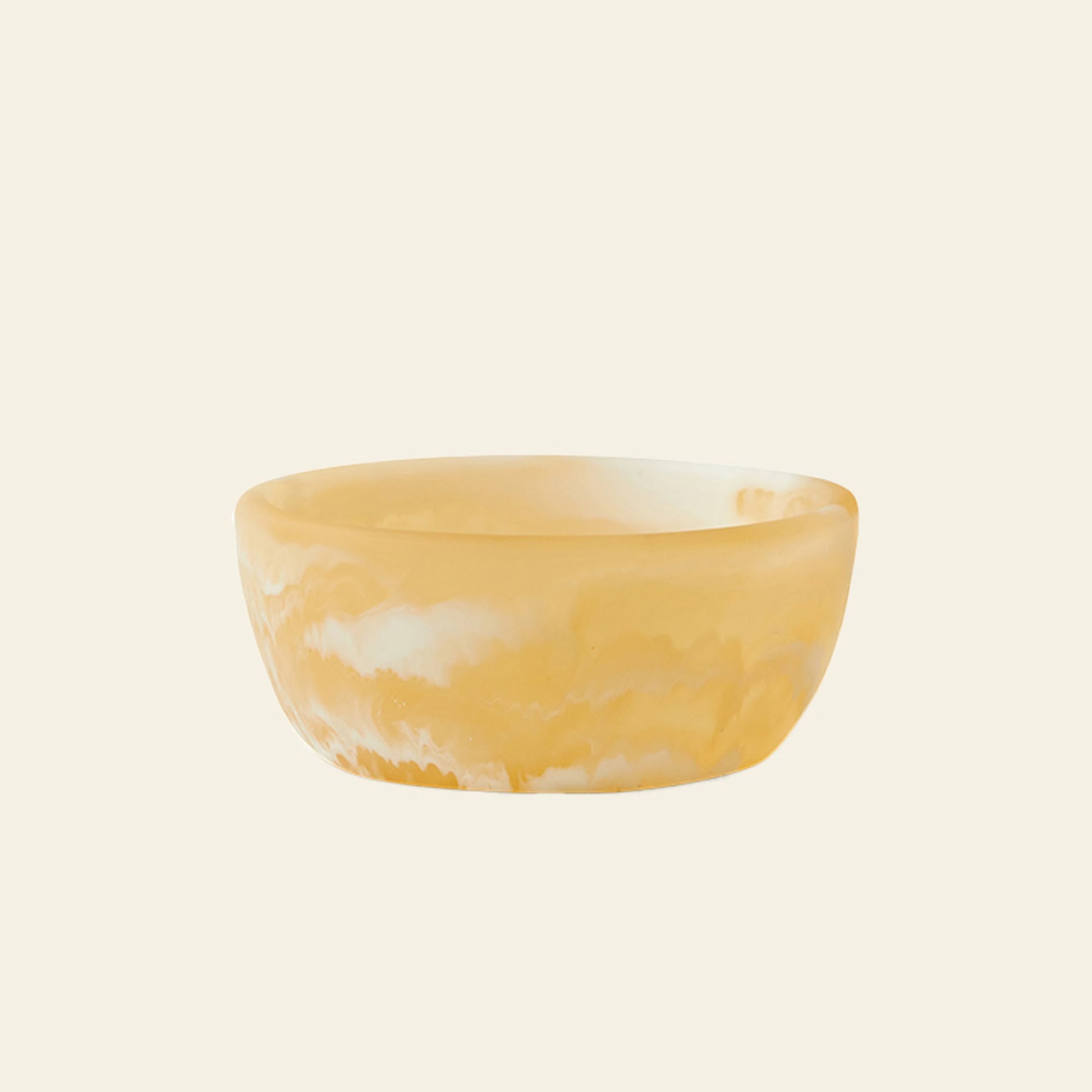The HKLIVING Patio Bowl by HKLIVING is a small, round bowl crafted from yellow and white marbled onyx with a smooth, glossy finish—ideal for outdoor entertaining. Featured against a plain, light beige background.