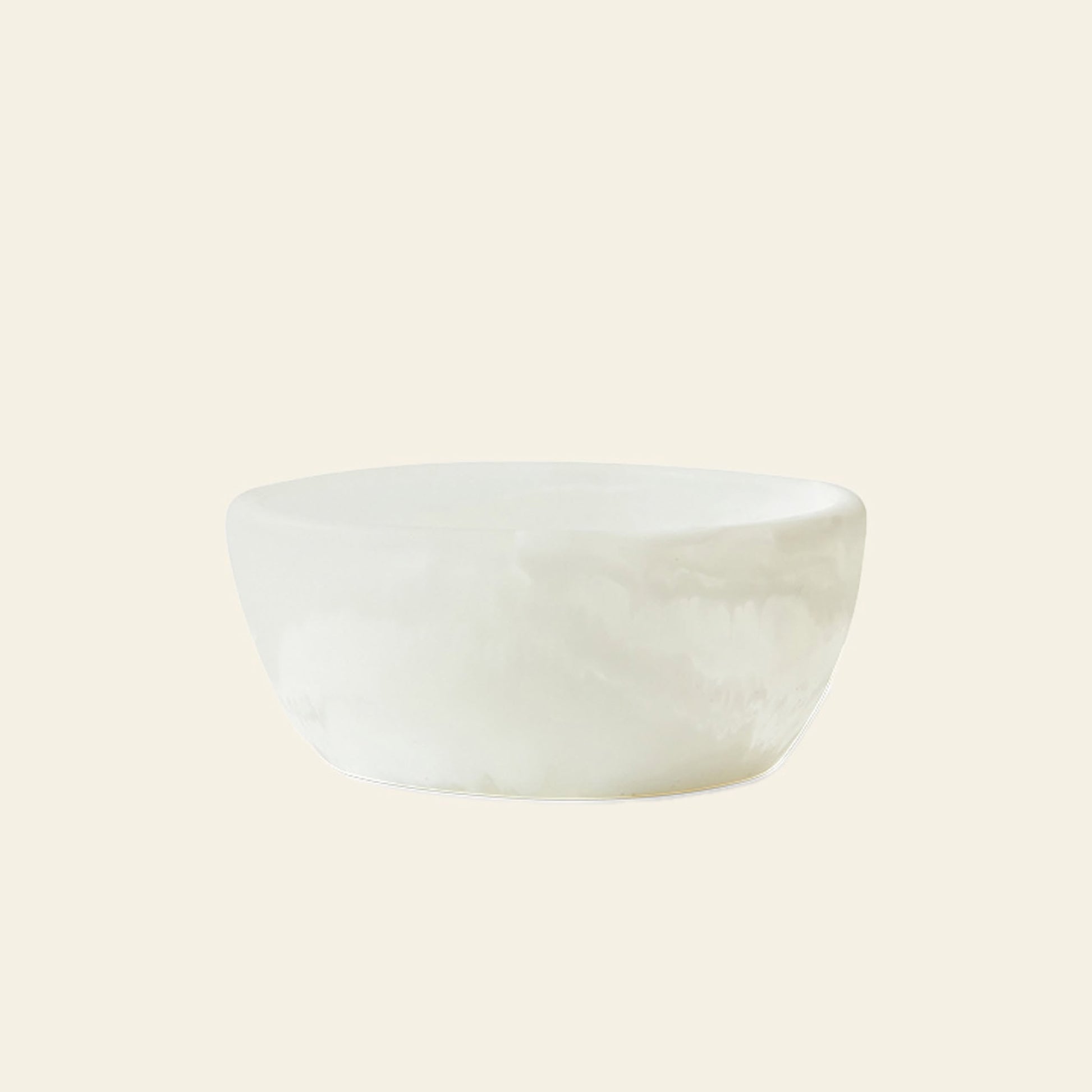 The HKLIVING Patio Bowl by HKLIVING, featuring smooth, rounded edges and a plain white ceramic design, is displayed against a light beige background—ideal for outdoor entertaining.