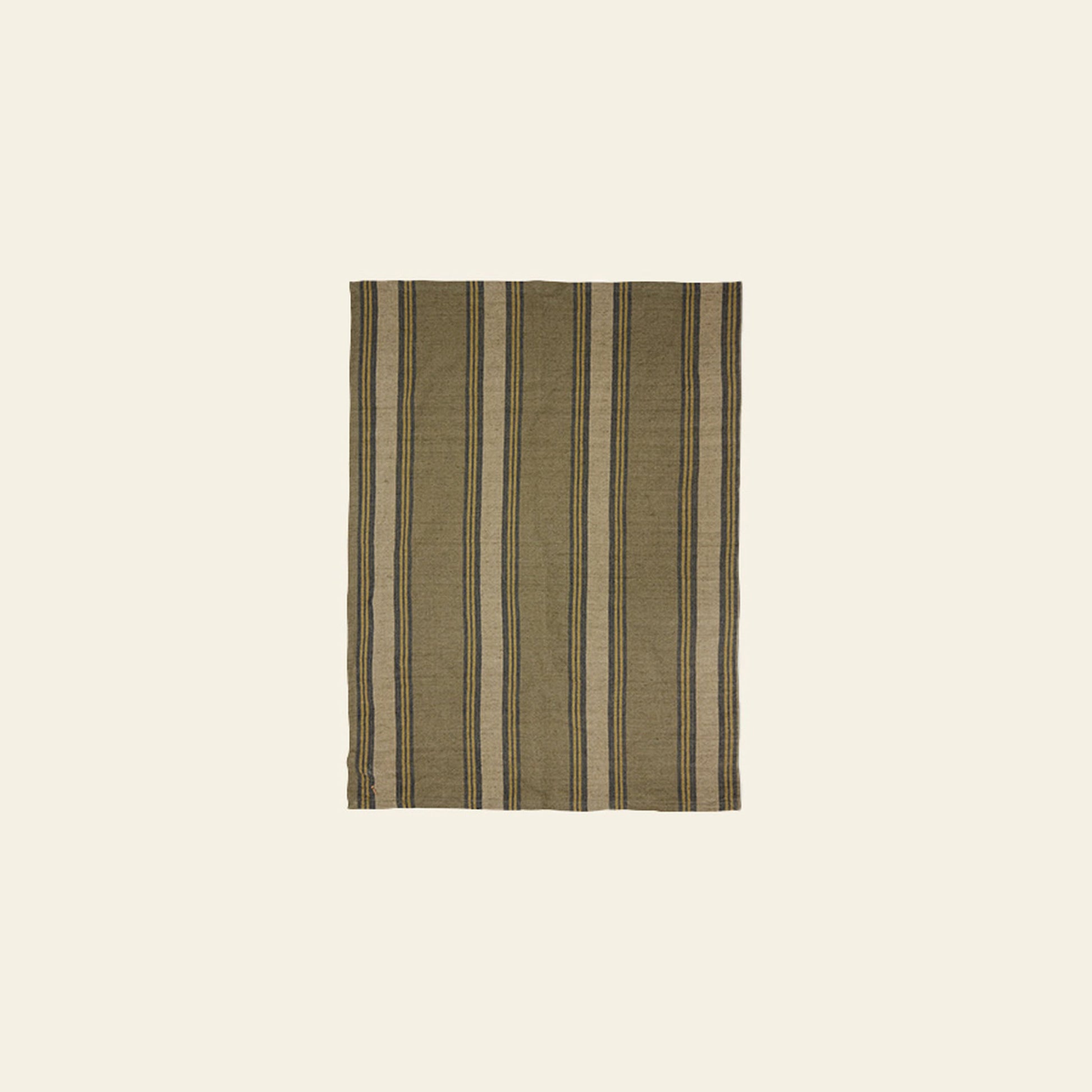 The HKLIVING Vida Striped Tea Towel in sand and cream features vertical black and beige stripes, echoing classic linen and cotton tea towel designs, shown against a plain light beige background.