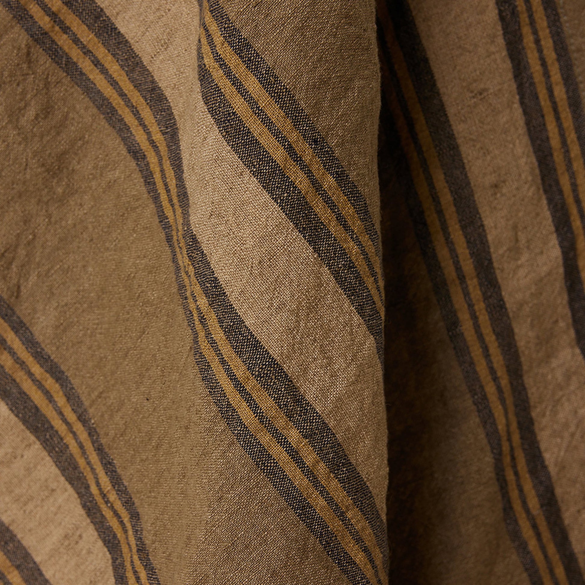 Close-up of the HKLIVING Vida Striped Tea Towel in sand and cream, highlighting its linen-cotton blend, chic stripes, and textured finish—perfect for adding elegance to your kitchen.