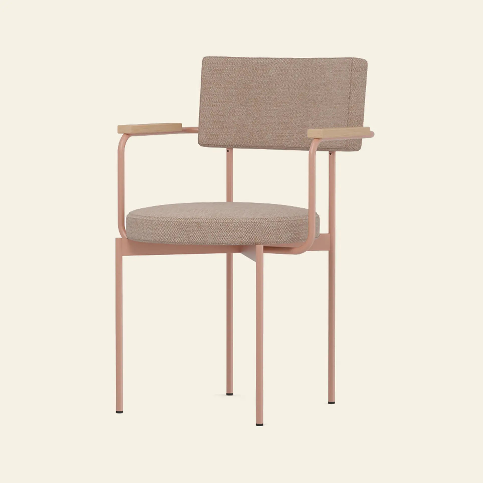 The HKliving Dining Armchair, Main Line Flax, Nude by HKliving features a light pink metal frame, padded tan fabric seat and backrest, and wooden armrest accents—perfect for customization against a plain beige background.
