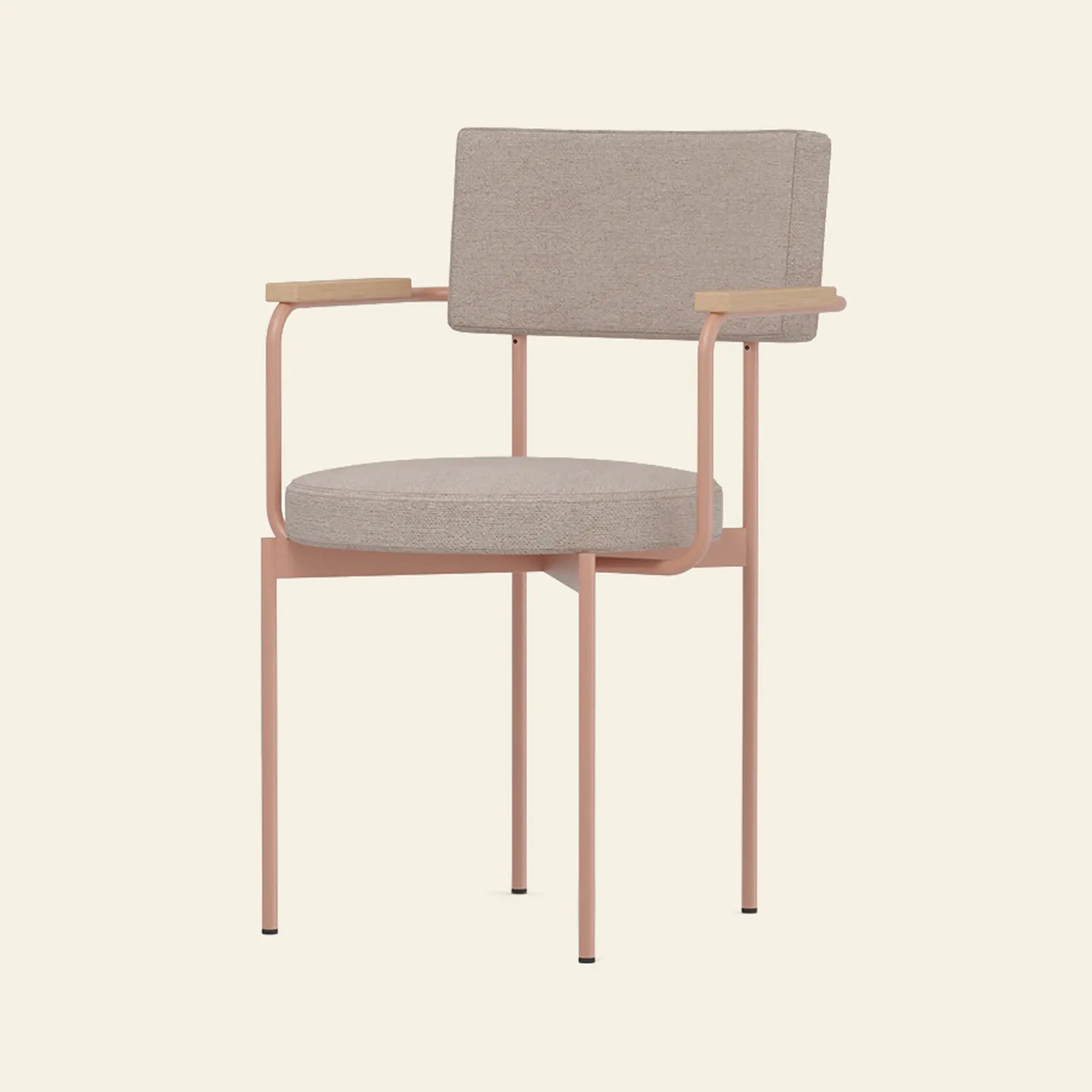 The HKliving Dining Armchair, Main Line Flax, Nude by HKliving features a blush pink metal frame, beige cushioned seat and backrest, and light wooden armrests inspired by Dutch design, set against an off-white background.