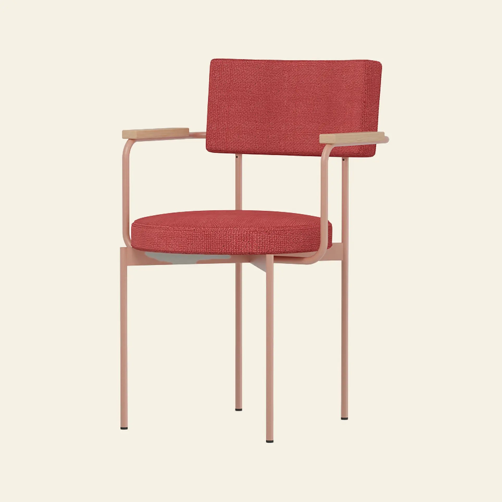 The HKliving Dining Armchair, Yoredale in Nude by HKliving features a cushioned red seat and backrest, light wooden armrests, and pink metal legs—an elegant Dutch design, ideal as customizable dining chairs for modern interiors. Displayed on a beige background.