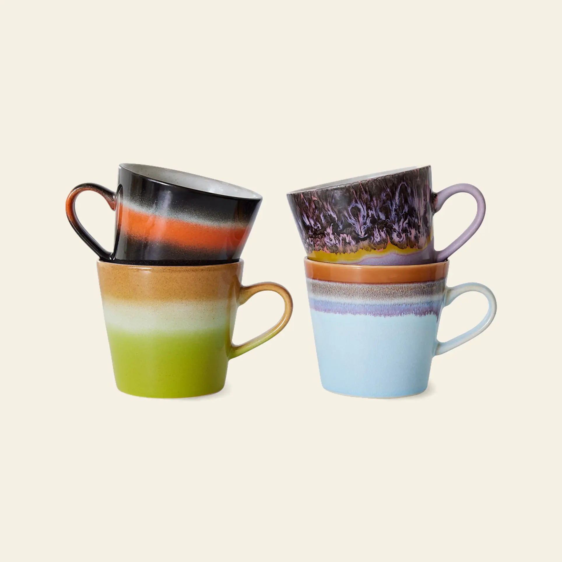 The HKliving 70s Ceramics: Cappuccino Mugs, Set of 4, feature colorful retro designs—perfect for adding vintage coffee bar decor to your space.