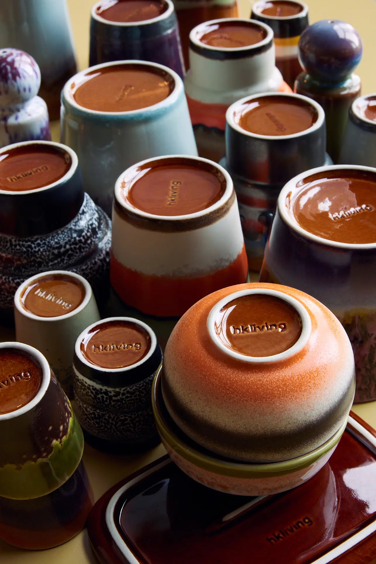 The HKliving 70s Ceramics Cappuccino Mugs, Set of 4, feature vibrant glazes and unique patterns. Stamped with HKliving, these colorful mugs make stylish coffee bar decor.