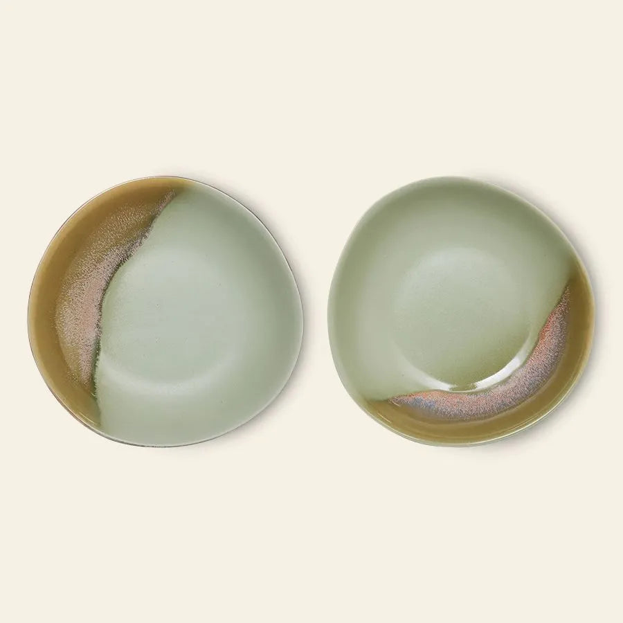 The HKliving 70s Ceramics: Curry Bowls, Set of 2, feature a soft green glaze with brown accents, arranged side by side on a light beige background for a vintage look.