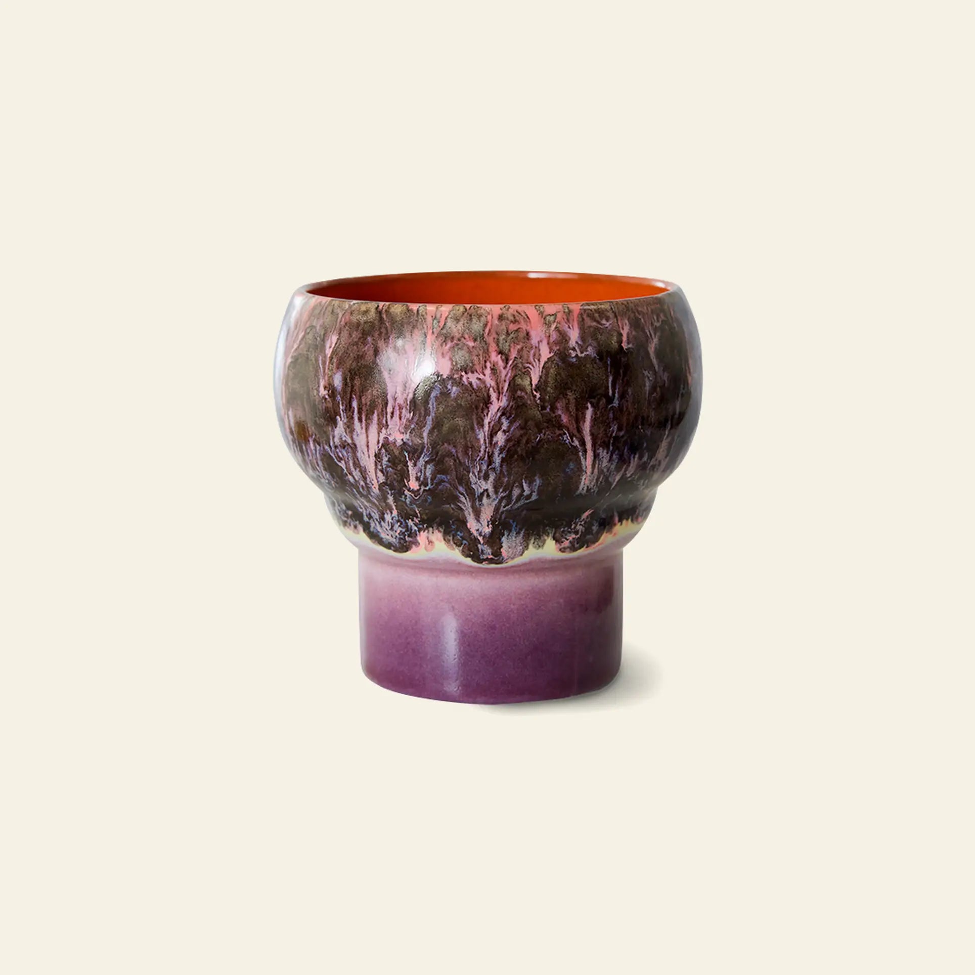 The HKLIVING 70s Ceramics: Lungo Mugs, Set of 2 features brown, pink, and purple marbled patterns with a glossy finish and bright orange interiors—perfect for coffee aficionados.