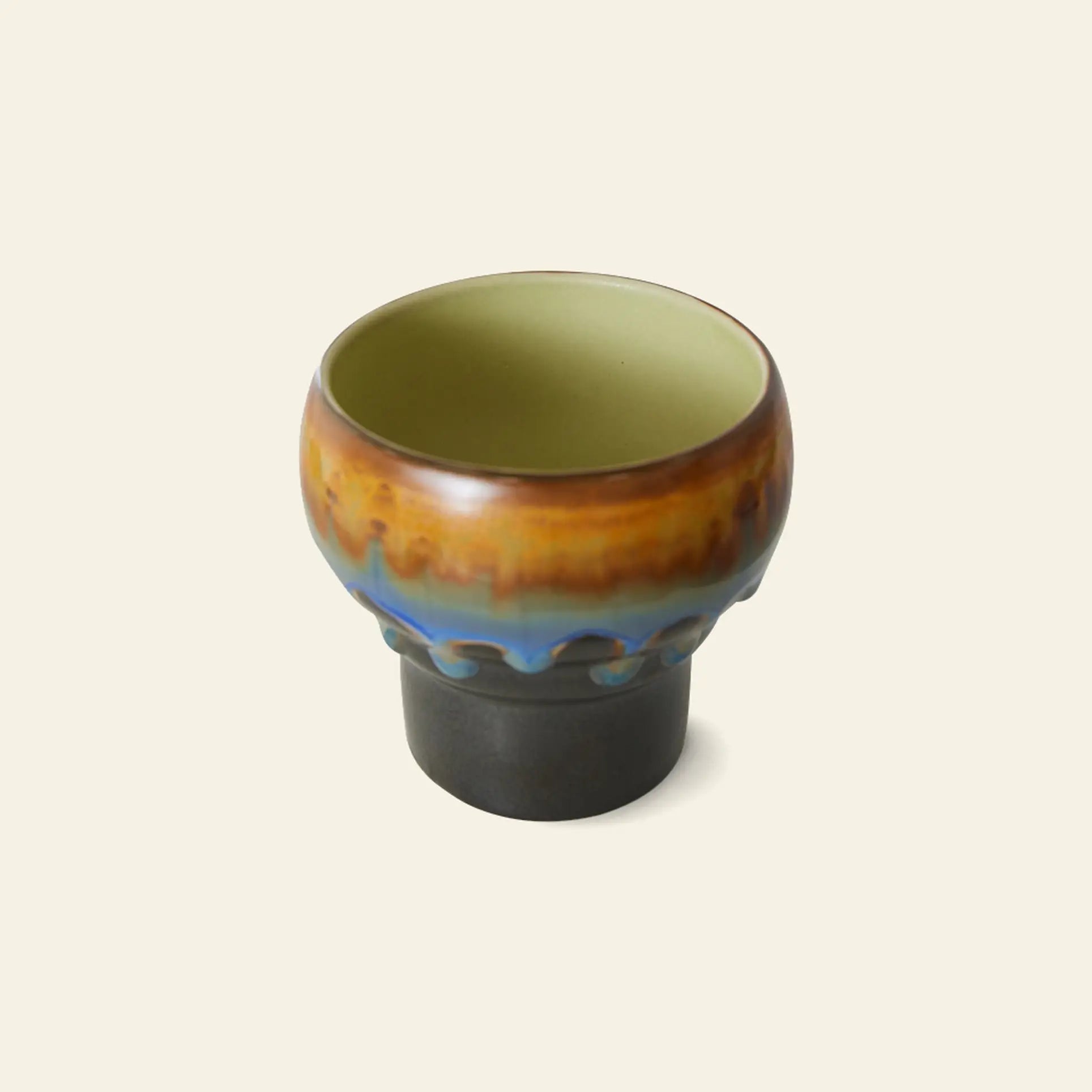 The HKLIVING 70s Ceramics: Lungo Mugs, Set of 2, features small ceramic mugs with round bowls, green glazed interiors, brown exteriors with blue drip accents, and matte black bases—ideal for coffee lovers.