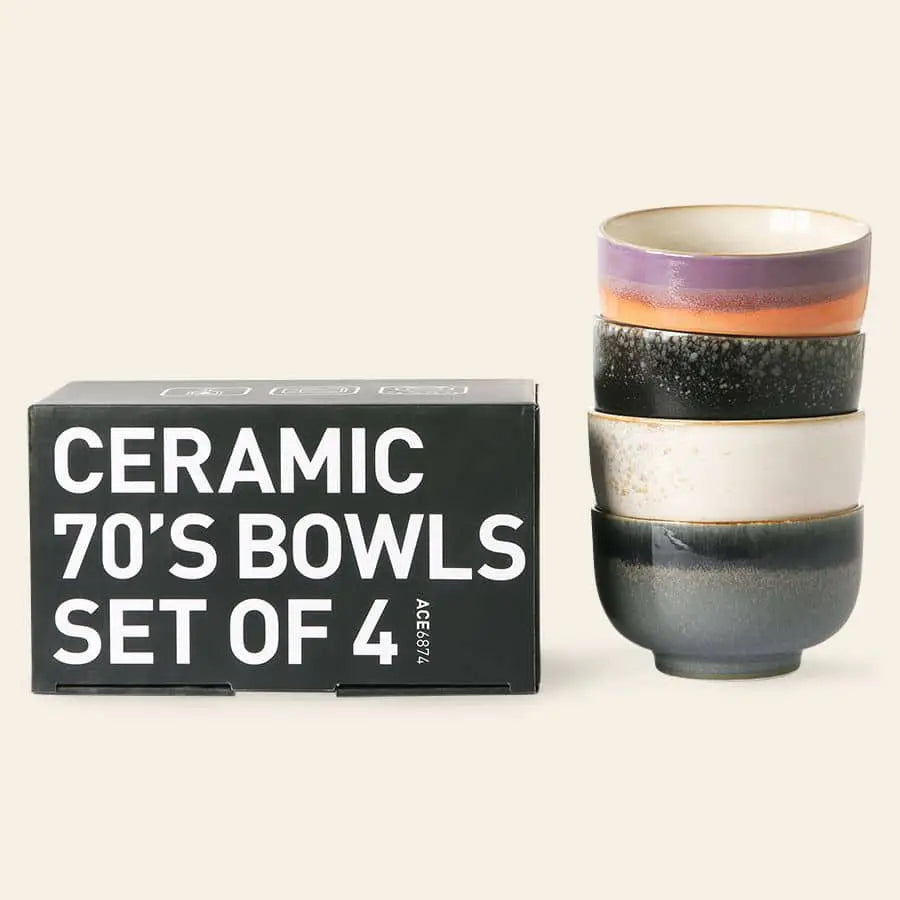 A set of four colorful HKliving 70s Ceramics Noodle Bowls sits beside a black HKliving box—ideal for stylishly serving your favorite dishes.