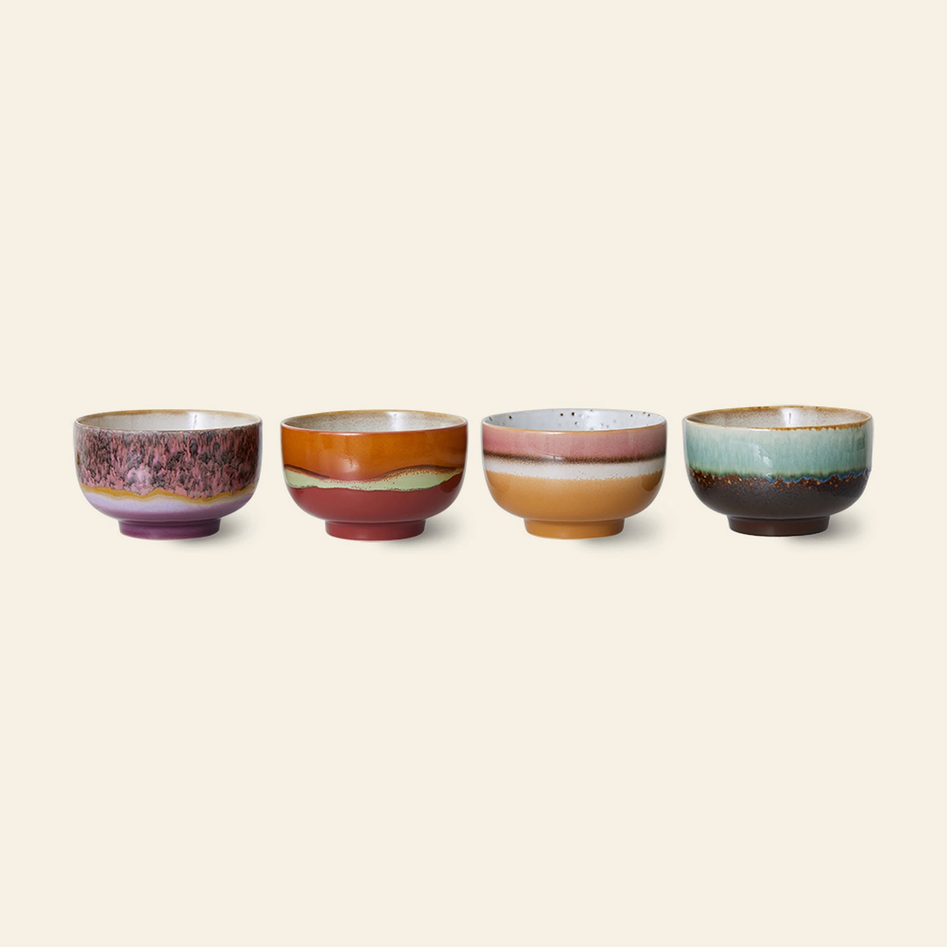 The HKliving 70s Ceramics: Noodle Bowls, Set of 4 features unique glaze patterns in shades of purple, orange, pink, beige, green, and brown—perfect for serving your favorite dishes in colorful style.