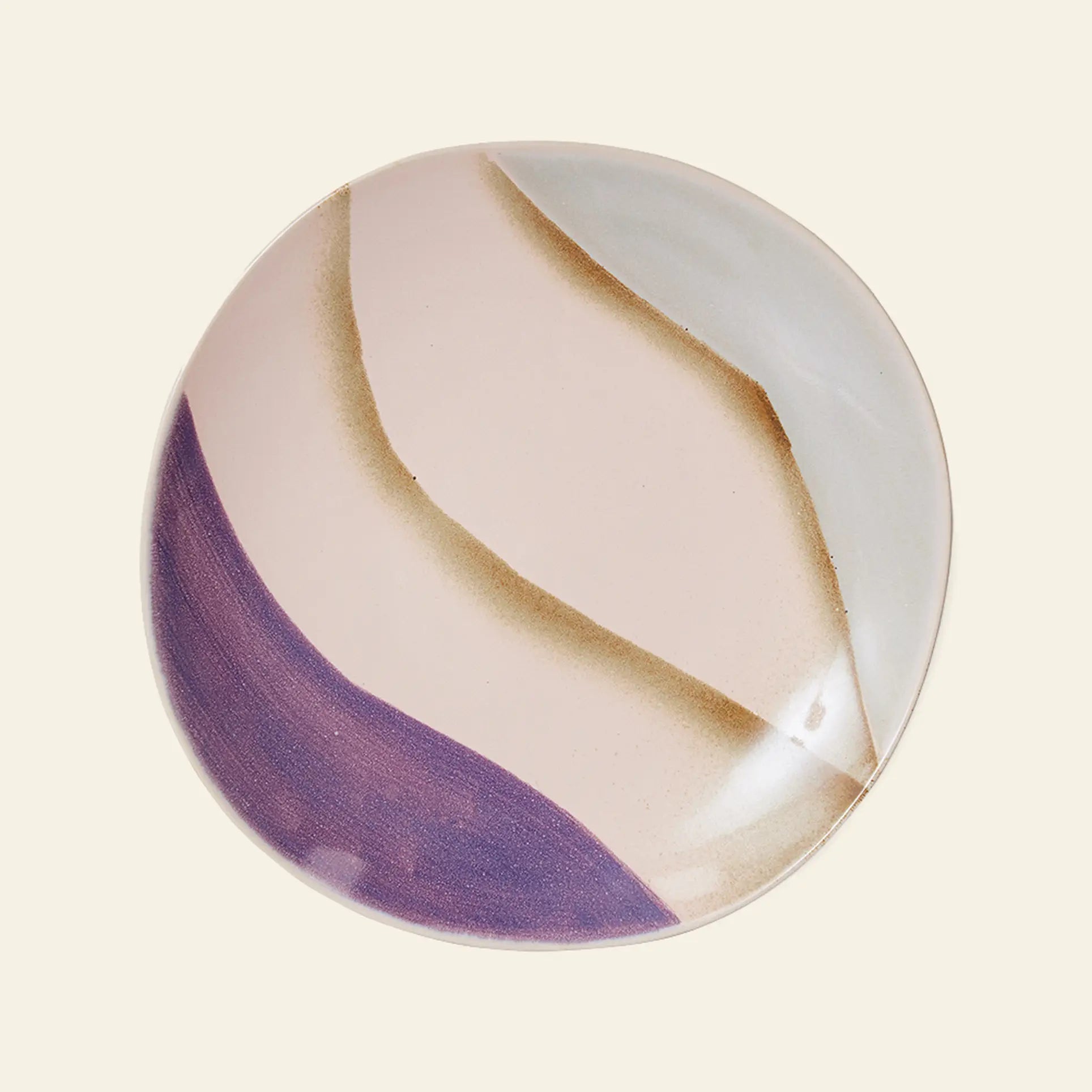 The HKliving 70s Ceramics: Side Plates, Set of 2, feature a pastel wavy design in pink, purple, tan, and blue on round ceramic plates, capturing the charming retro style of the 70s.