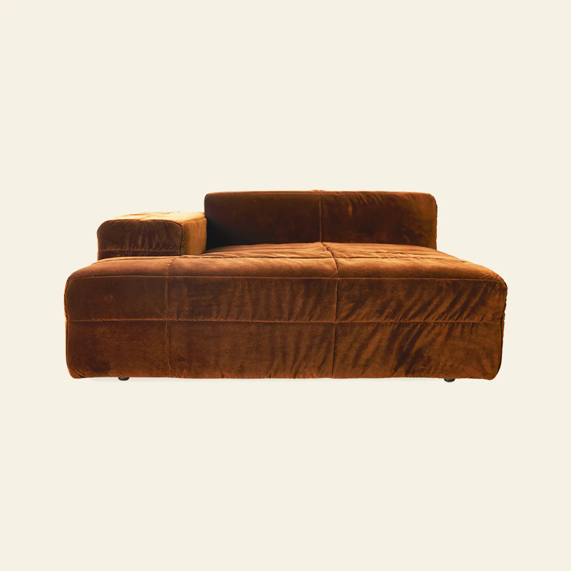 The HKliving Brut Sofa, Left by HKliving is a modern, low-profile brown velvet sofa with a wide seat, single left armrest, and plush cushioning for comfort, displayed against a plain off-white background.