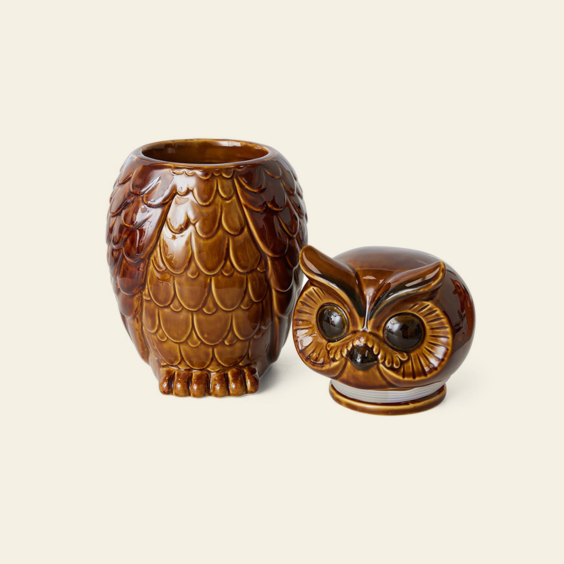 The HKliving Ceramic Owl Jar by HKliving is a vintage-style brown ceramic storage jar shaped like an owl, with the head removed and set aside to reveal the opening, featuring a charming retro design.
