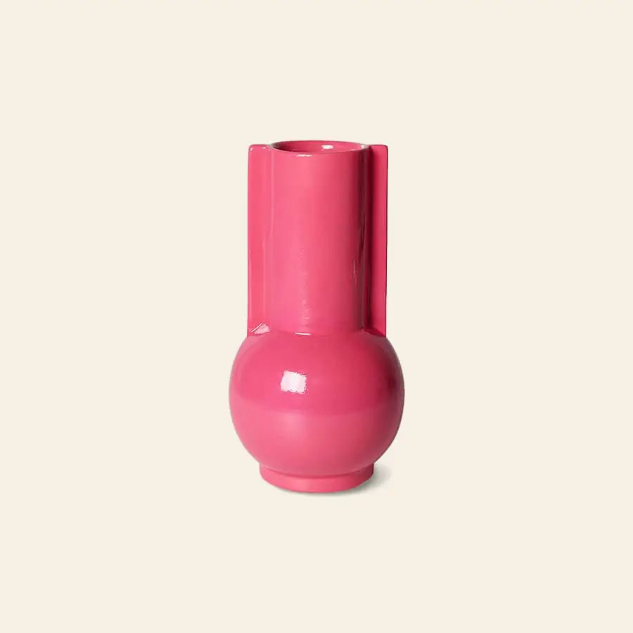 The HKliving Ceramic Vase Hot Pink features a glossy, vibrant finish with a rounded base and tall cylindrical neck, bringing bold Barbie-esque charm to any space. Brand: HKliving.