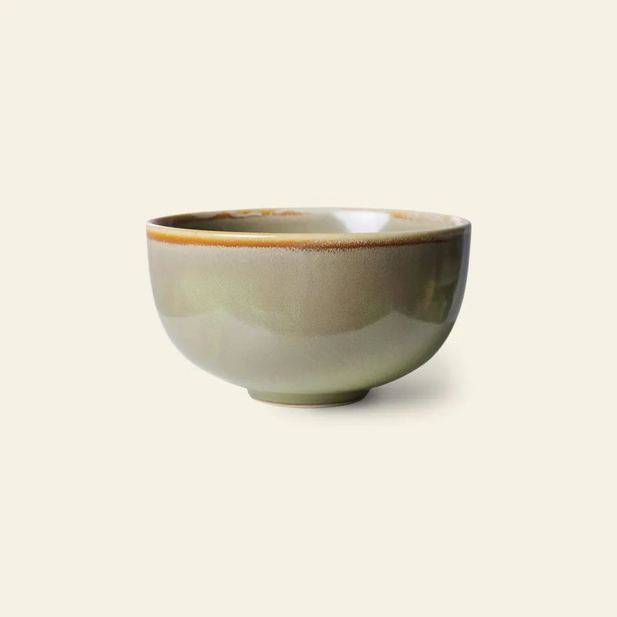 The HKliving Chef Ceramics: Bowl by HKliving features a smooth, glossy greenish-brown reactive glaze, a slightly rounded shape, and a small base—making it a stylish addition to your tableware essentials.