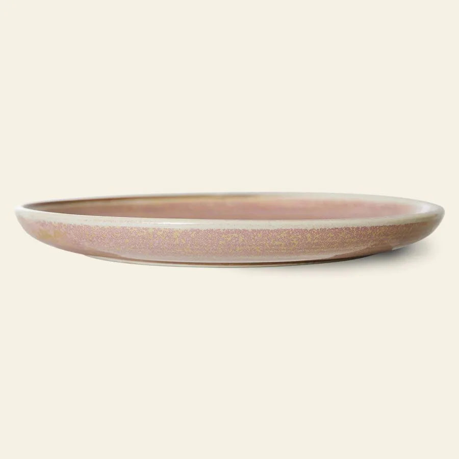 The HKliving Chef Ceramics: Dinner Plate features a shallow, round design with a muted pinkish-brown glaze—an elegant tableware essential from HKliving, shown against a plain light background.