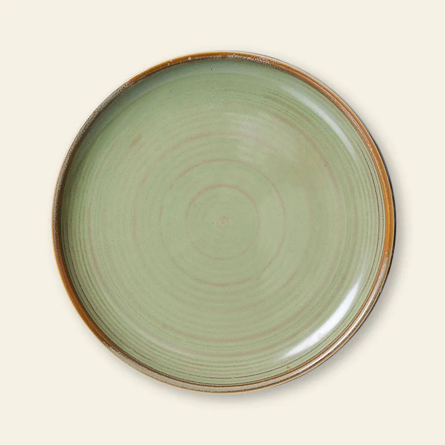 The HKliving Chef Ceramics: Side Plate features a pale green, slightly speckled reactive glaze and brown rim—an artisanal touch from HKliving, ideal for fans of handcrafted tableware.