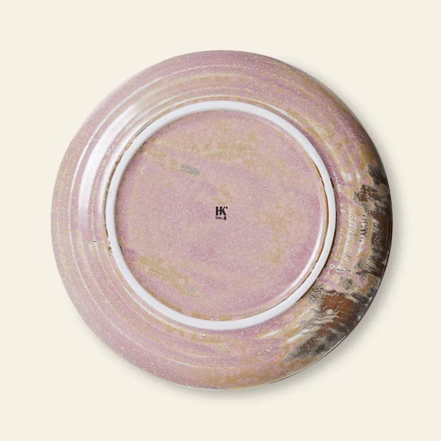 The HKliving Chef Ceramics Side Plate showcases a pink and beige marbled reactive glaze with a metallic sheen on one side, plus an HK makers mark at the center—a beautiful artisanal piece from HKliving.