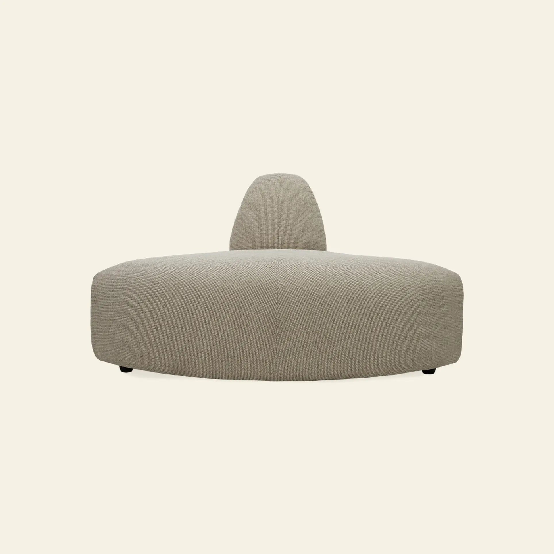 The HKliving Jax Couch, Angle by HKliving is a modern, minimalist light gray sofa with a wide rounded base and single short backrest, set against a plain off-white background.