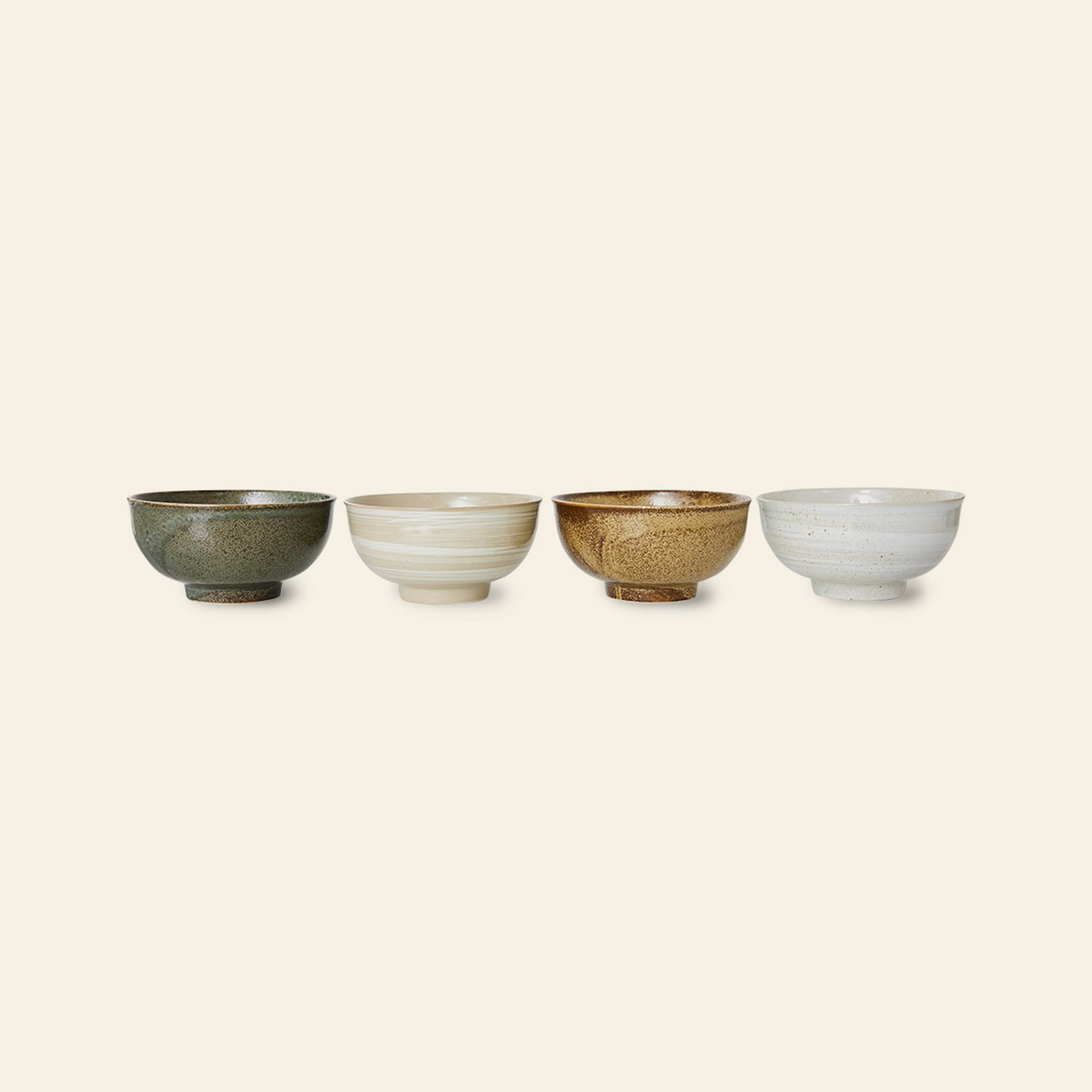 Four HKliving Kyoto Ceramics Japanese Noodle Bowls, set of 4 in green, beige, brown, and white earth tones, are arranged side by side against a plain light background.
