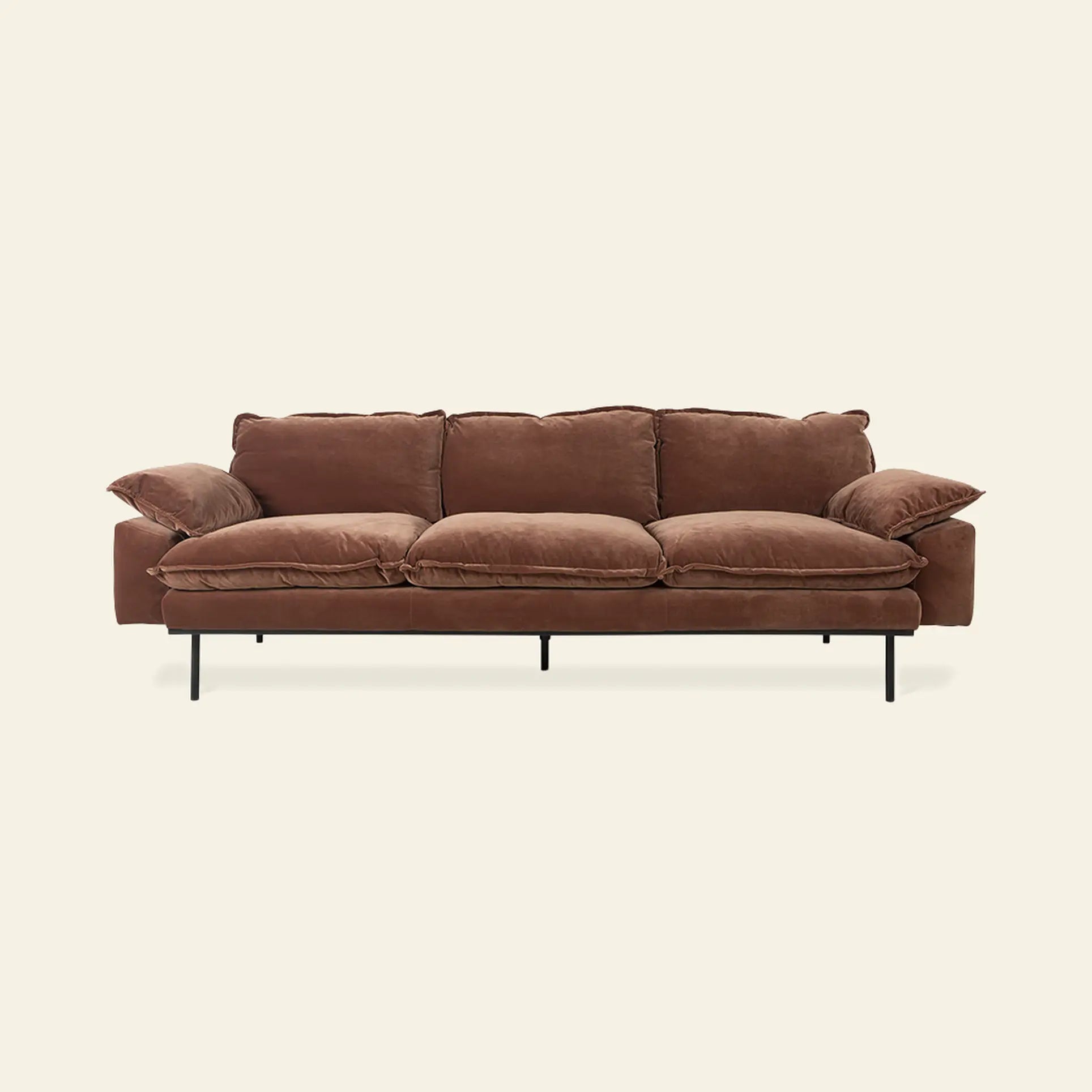 The HKliving Retro Sofa, 4-Seats, by HKliving features plush brown velvet upholstery, overstuffed cushions, and slim black metal legs for unmatched comfort and style in any living room, shown against a plain light background.