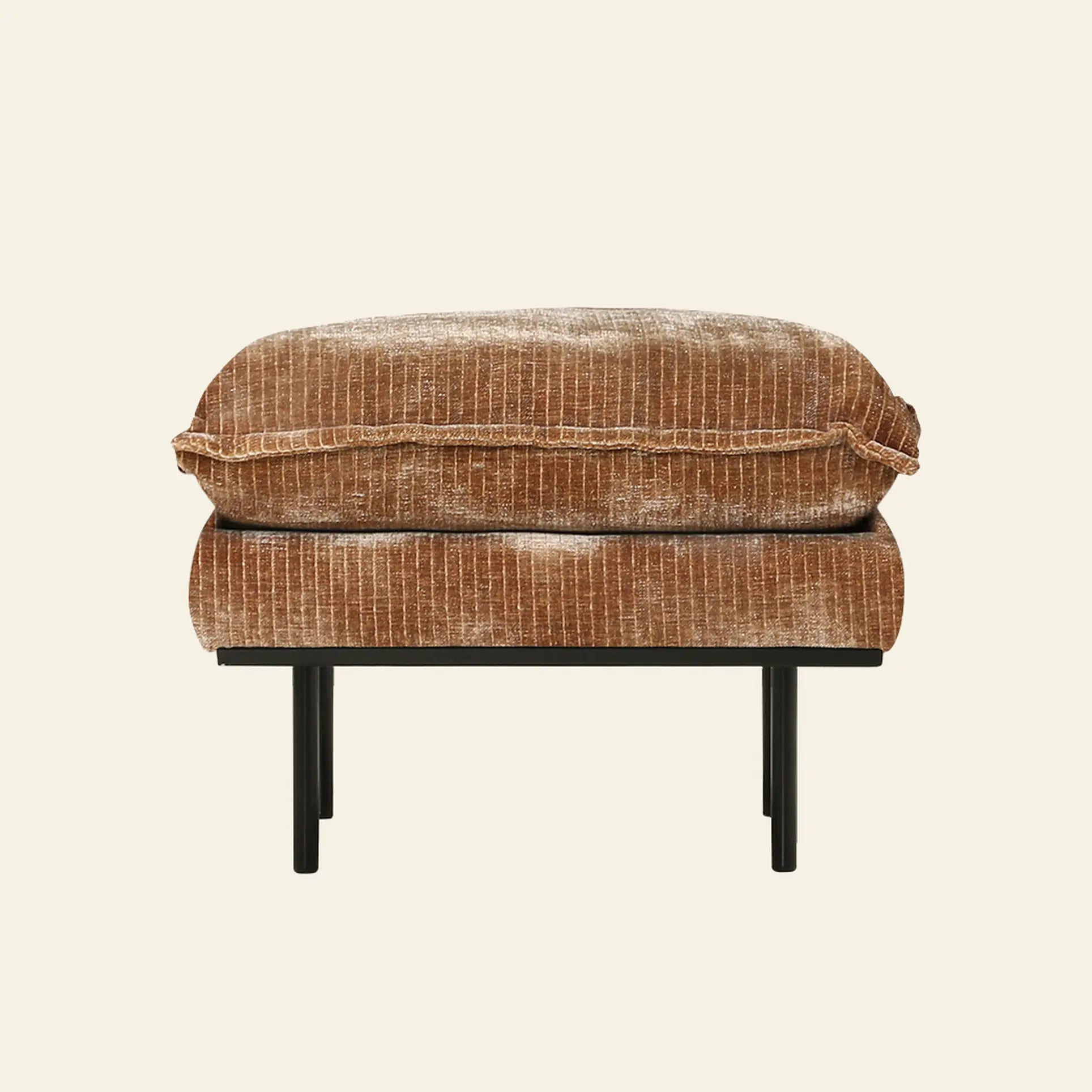 The HKliving Retro Sofa, Hocker by HKliving is a brown velvet rectangular ottoman featuring a plush cushioned top and slim black metal legs, offering comfort and style to any living space, shown against a plain beige background.