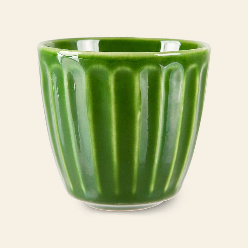 The HKliving The Emeralds: Ceramic Mug Ribbed, Set of 4 features small, glossy green ceramic mugs with a ribbed design and tapered base—ideal for coffee lovers and presented against a plain light background.