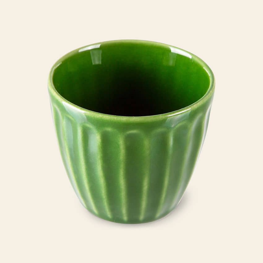 The HKliving The Emeralds: Ceramic Mug Ribbed, Set of 4 features stylish green ceramic mugs with a ribbed design and smooth interior, ideal for coffee lovers. Presented by HKliving against a simple light background.