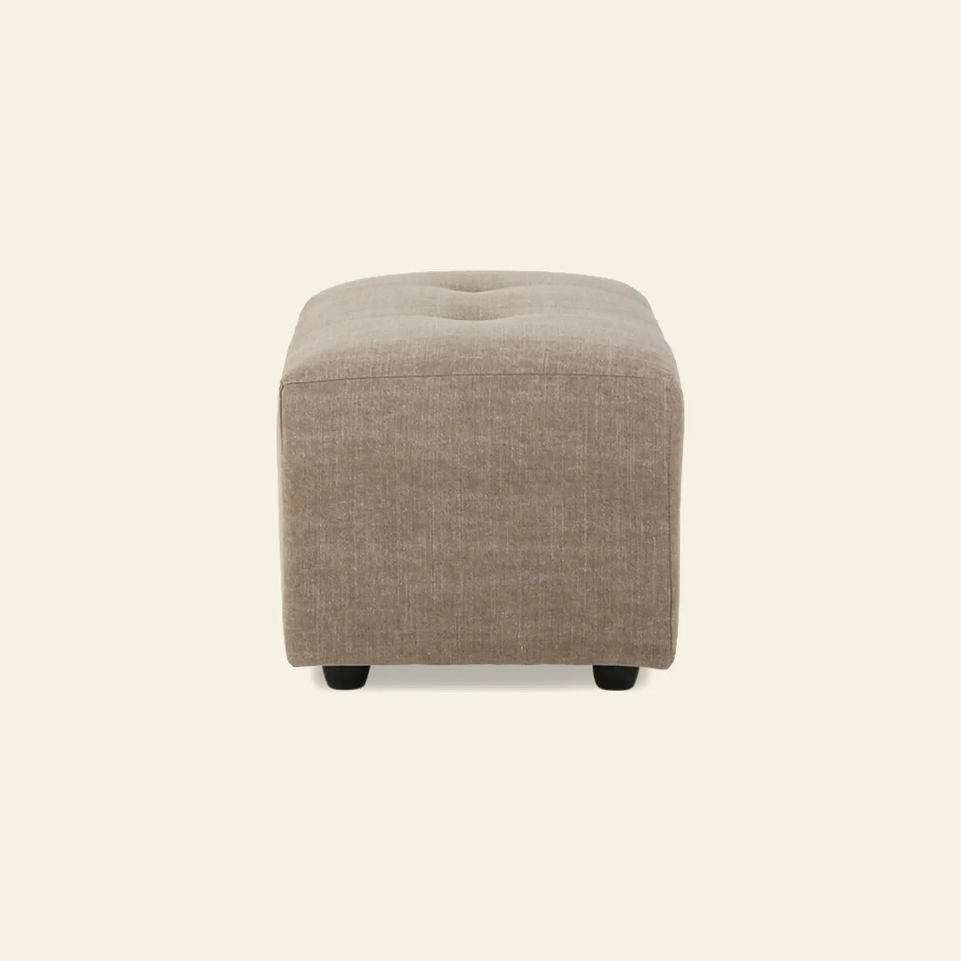 The HKliving Vint Couch, Hocker Small by HKliving is a square, light brown ottoman with tufted top—perfect for versatile living spaces or pairing with the Vint sofa. Shown on a plain off-white background.