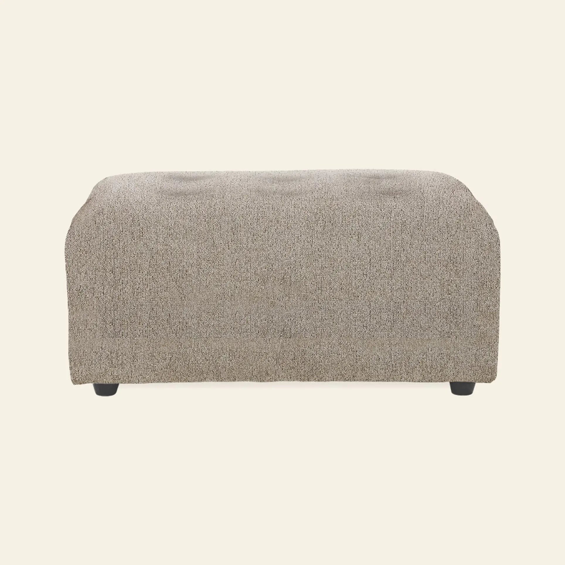 The HKliving Vint Couch Hocker is a rectangular, light brown ottoman with textured upholstery and short black legs, designed to match the Vint sofa by HKliving, shown against a plain beige background.