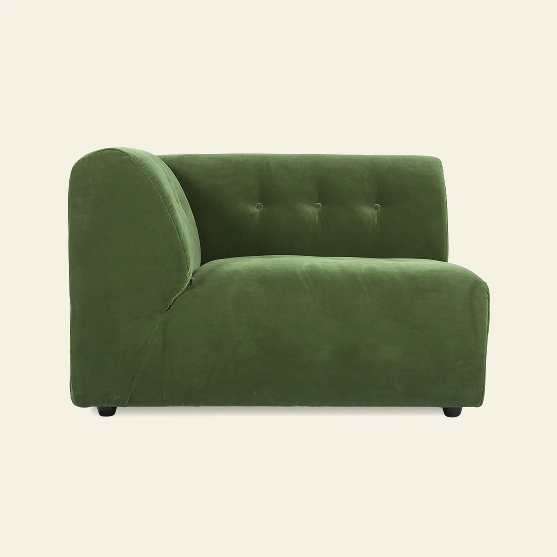 The HKliving Vint Couch, Left, 1.5-Seat by HKliving features green velvet upholstery, a tufted backrest, rounded left side, and low black legs—perfect for a customizable living space on a light beige background.