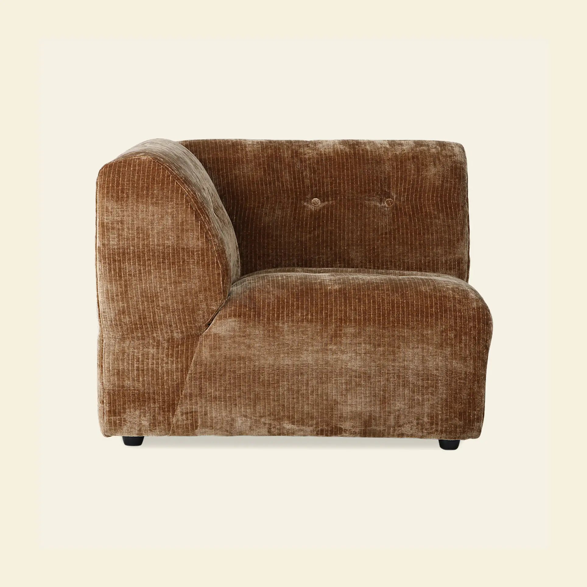 The HKliving Vint Couch, Left by HKliving is a brown, plush corduroy sectional with a low back and rounded edges, featuring adaptable components and shown from the side against a plain, light background.