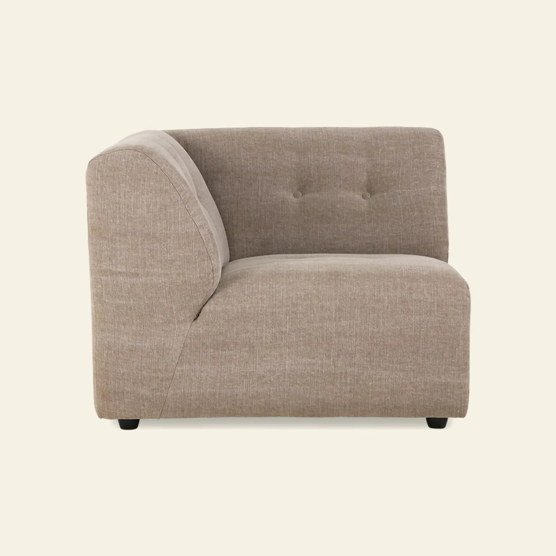 The HKliving Vint Couch, Left by HKliving is a modern light brown sectional with a tufted backrest and plush cushions. Shown in profile against an off-white background, its perfect for creating a customizable living space.