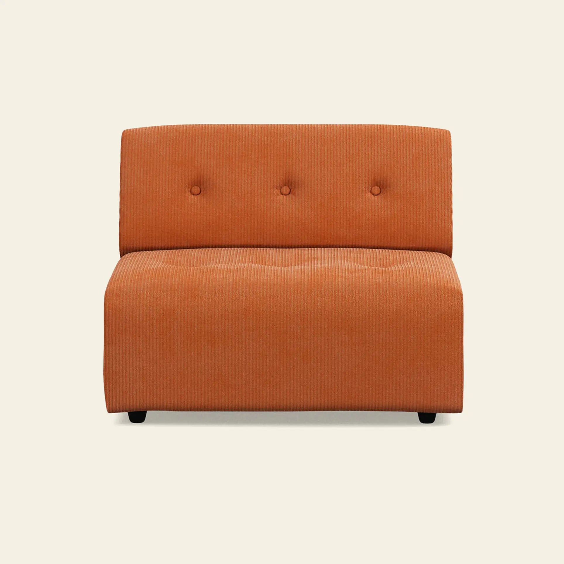 The HKliving Vint Couch, Middle by HKliving is a modern armless orange corduroy chair with three backrest buttons and low black legs, featuring customizable seating and shown against an off-white background.