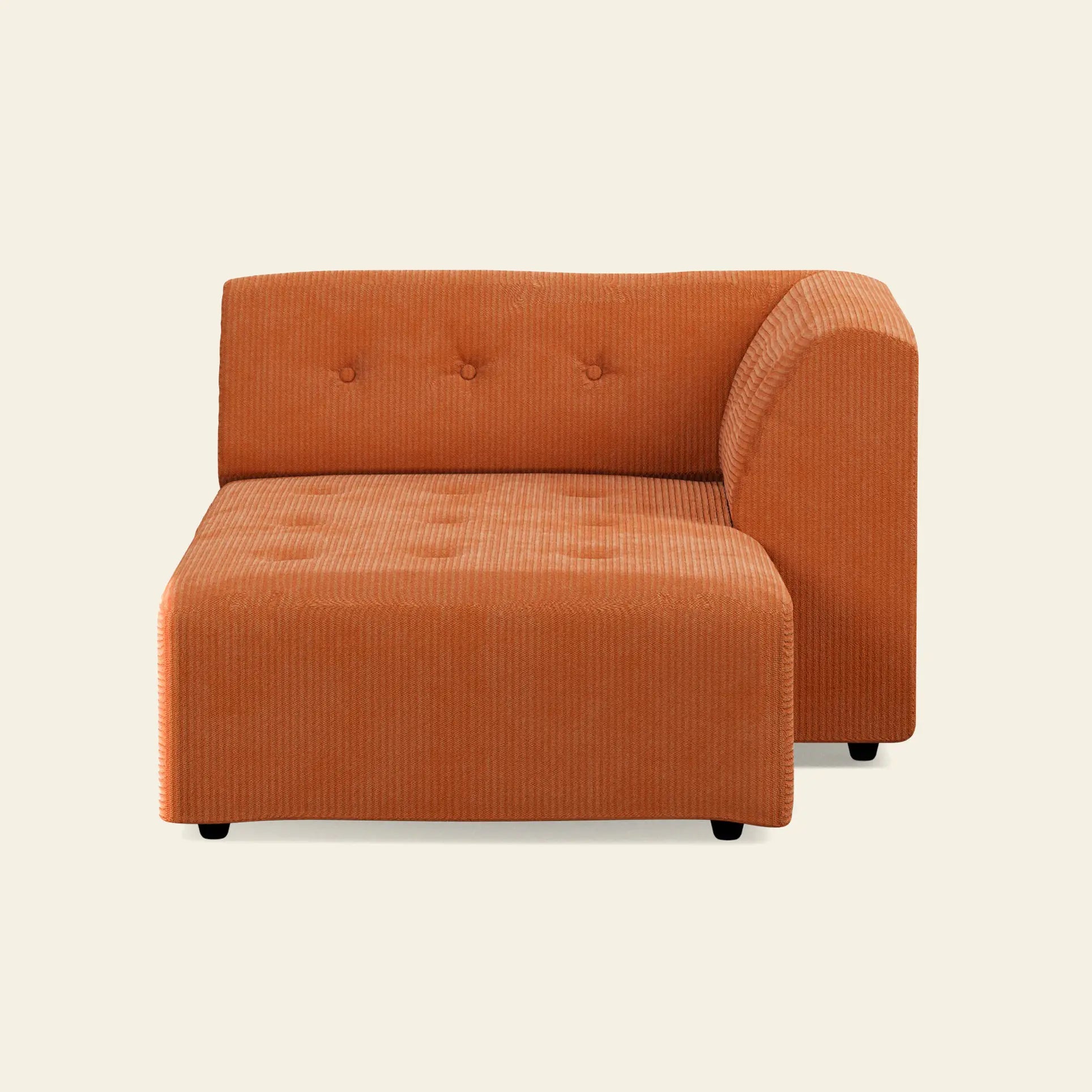 The HKliving Vint Couch, Right Divan by HKliving is an orange, modern sofa chair with corduroy upholstery, tufted seat and backrest, and a partial right-side armrest. Customizable components suit your space, shown against a plain light background.